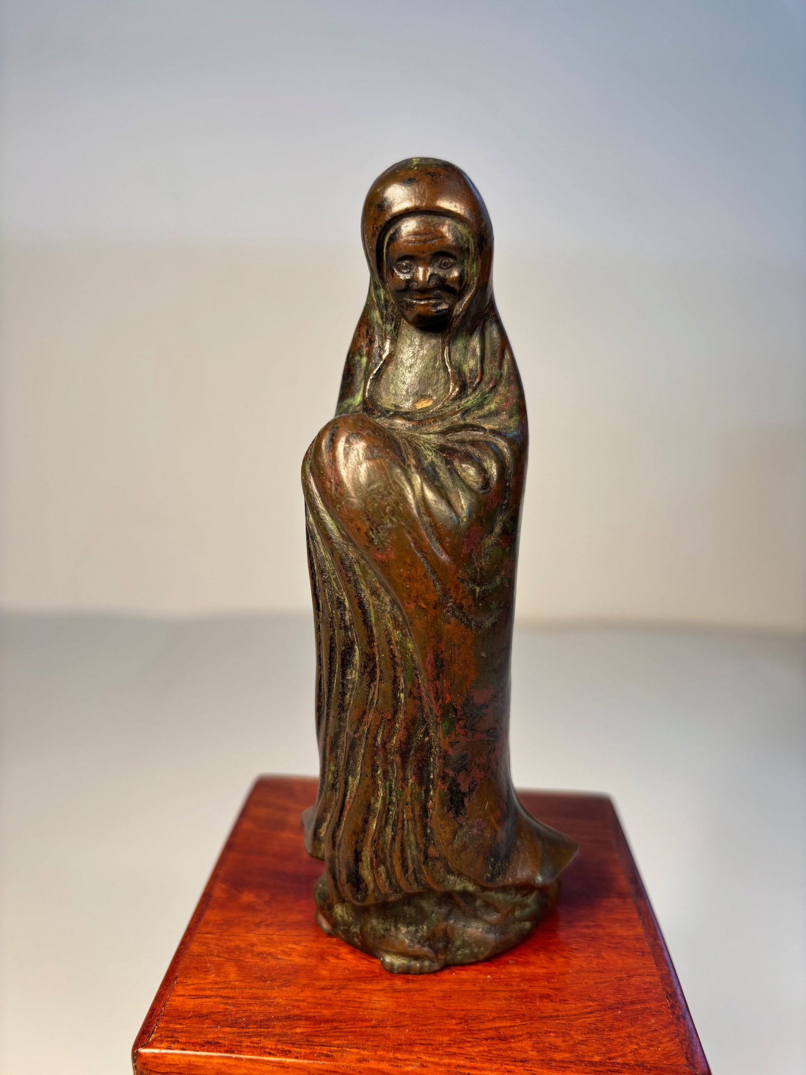 A Japanese Bronze Daruma statue: Edo period (1603–1868), The patina (greenish or reddish oxidation) on the surface is natural for bronze, indicating age and authenticity. From an old Northshore Chicago family collection.Dimensions?