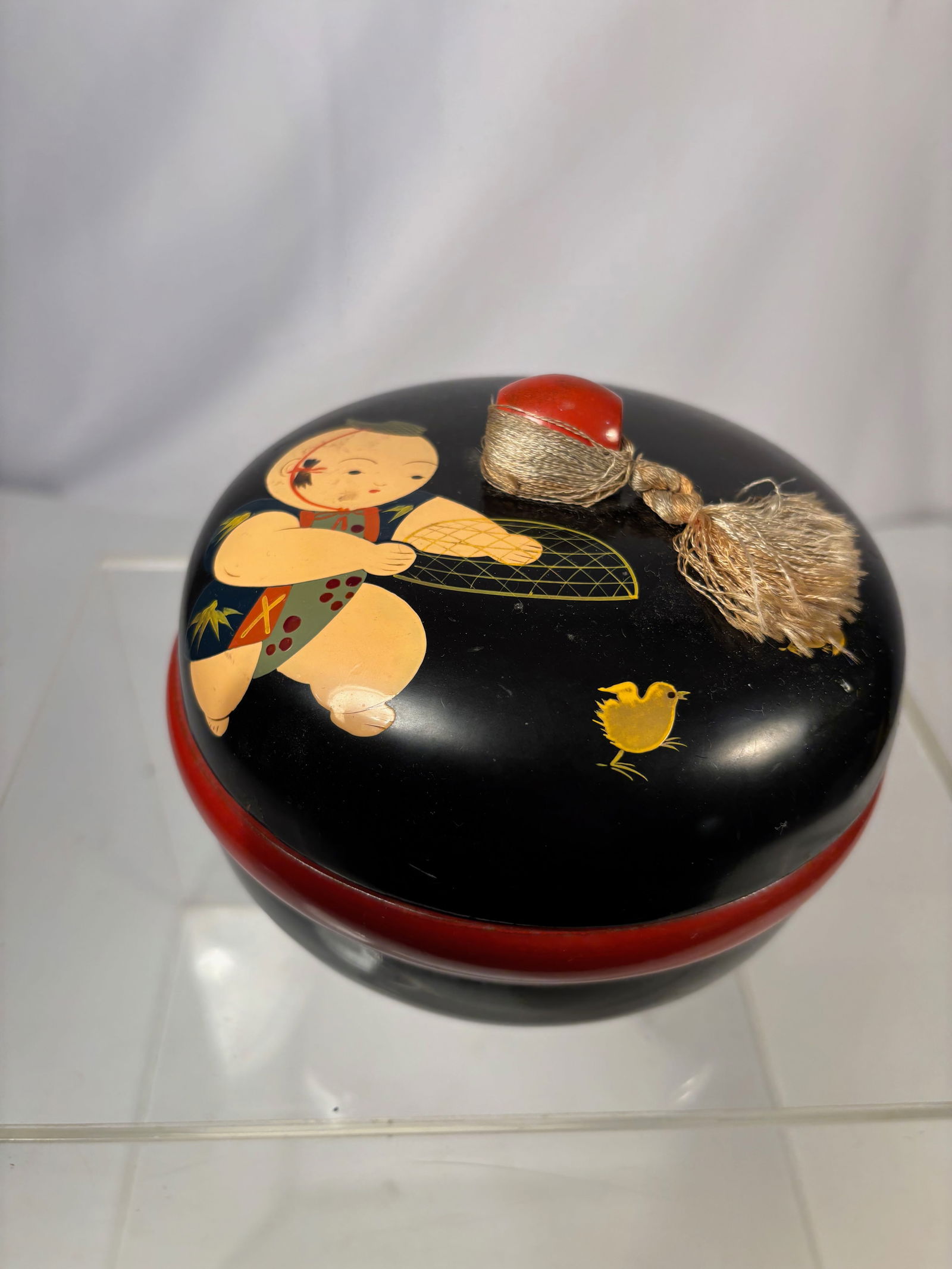 A Japanese Black Lacquer Covered Box with Figural Decoration (1 of 9)