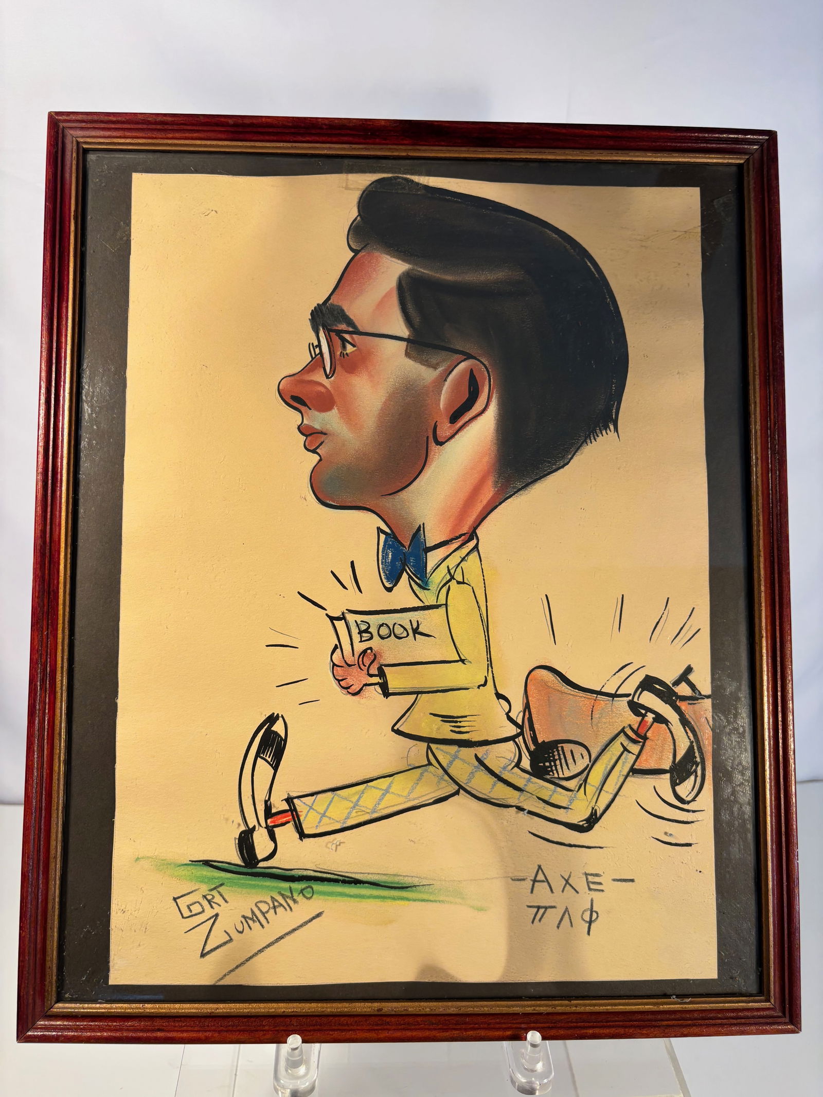 Caricature of a Young Man with Book, water color painting, Signed Grt Zumpano,: humorous caricature drawing signed Grt Zumpano, depicting a young man in a yellow suit with book in hand, running in exaggerated stride. Greek letter inscriptions “??? – ???” appear below,