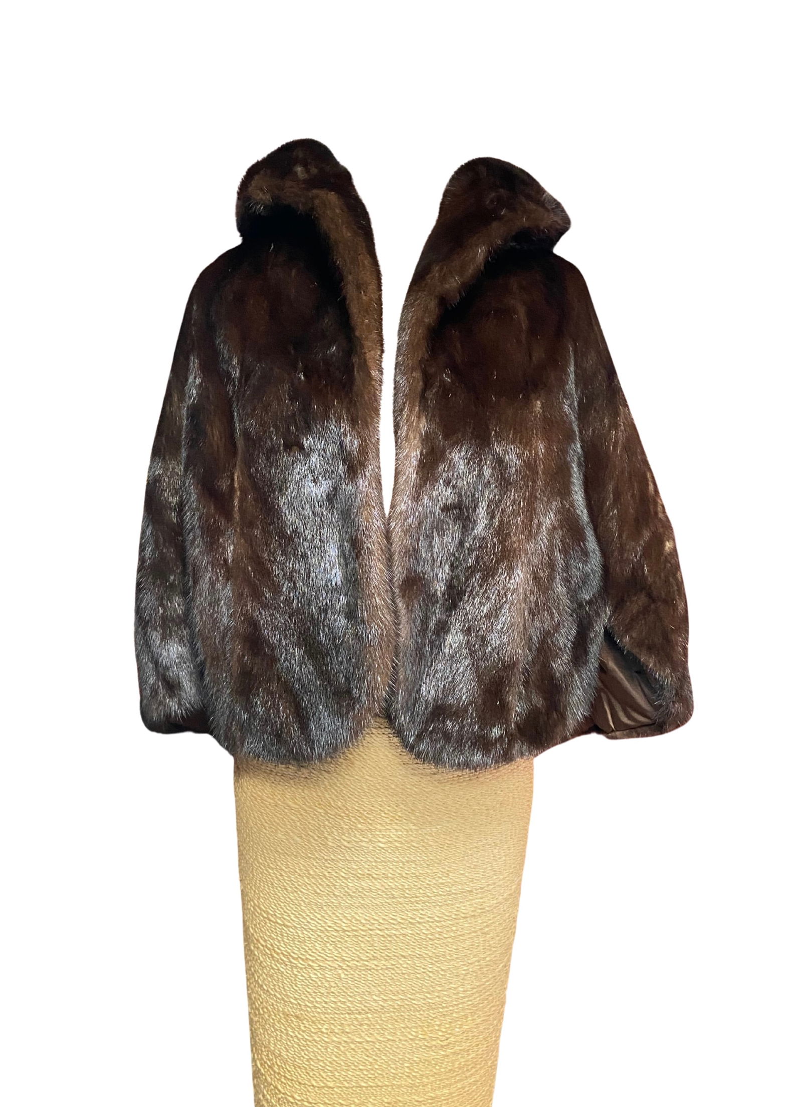 Dark Brown Mink Fur Capelet with Wide Shawl: Elegant mink fur capelet crafted in a rich natural dark brown tone with a lustrous sheen. Designed with a wide shawl collar and a cape-style silhouette. The dense, glossy mink fur is evenly matched