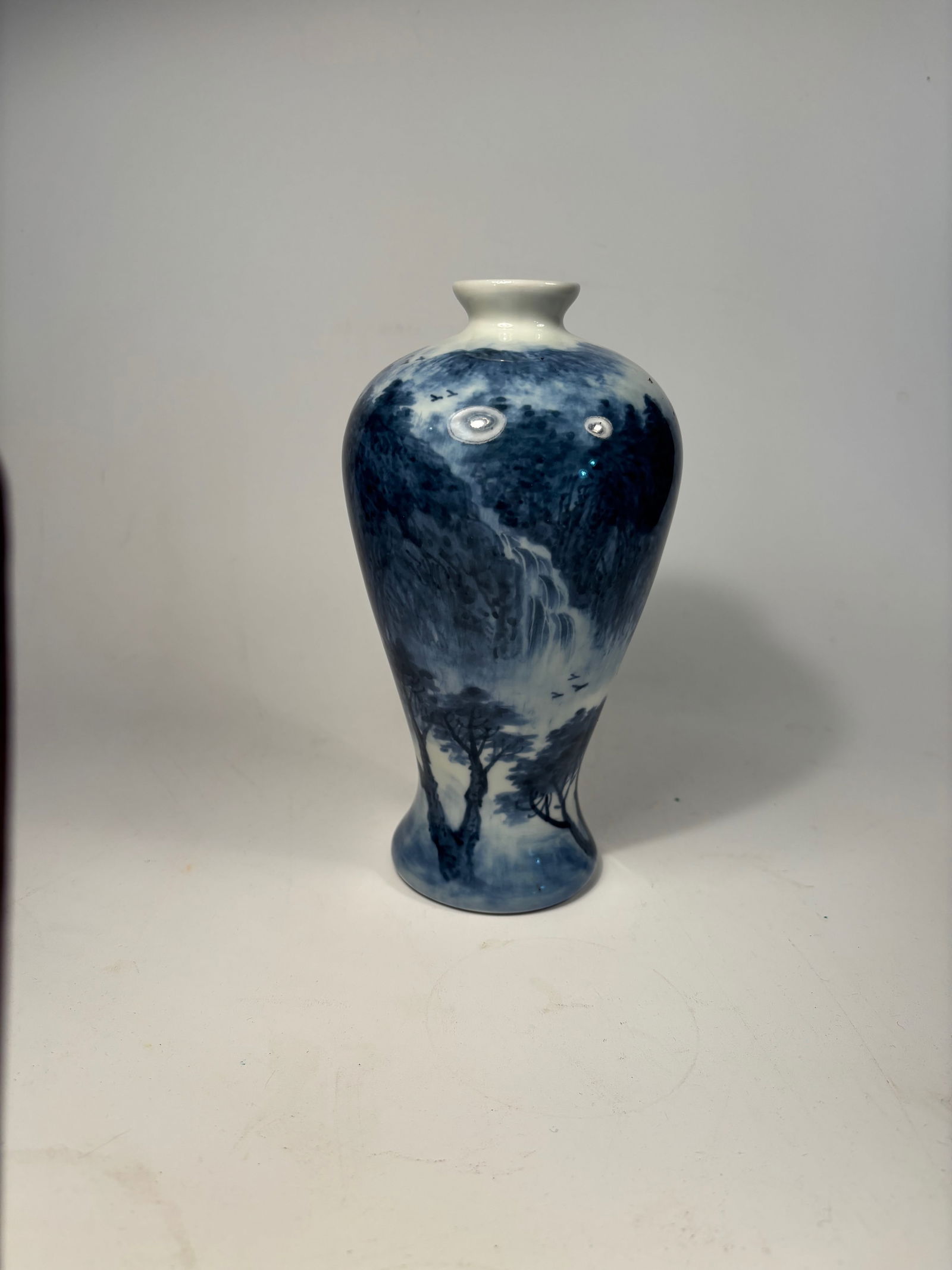 An Asian blue and white porcelain vase (1 of 14)