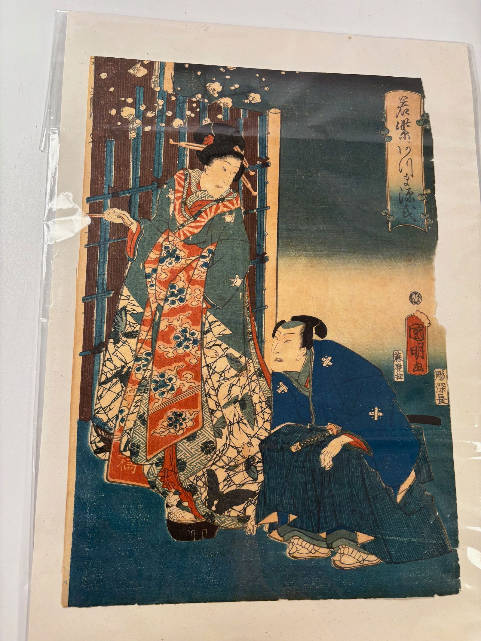 A Japanese Ukiyo-e Woodblock Print by Utagawa Kuniaki: 19Tth Century, Japanese ukiyo-e woodblock print depicting a historical figure scene, signed Kuniaki. Possibly from the late Edo to Meiji period. Height: 14 inches; Length: 9.75 inches.