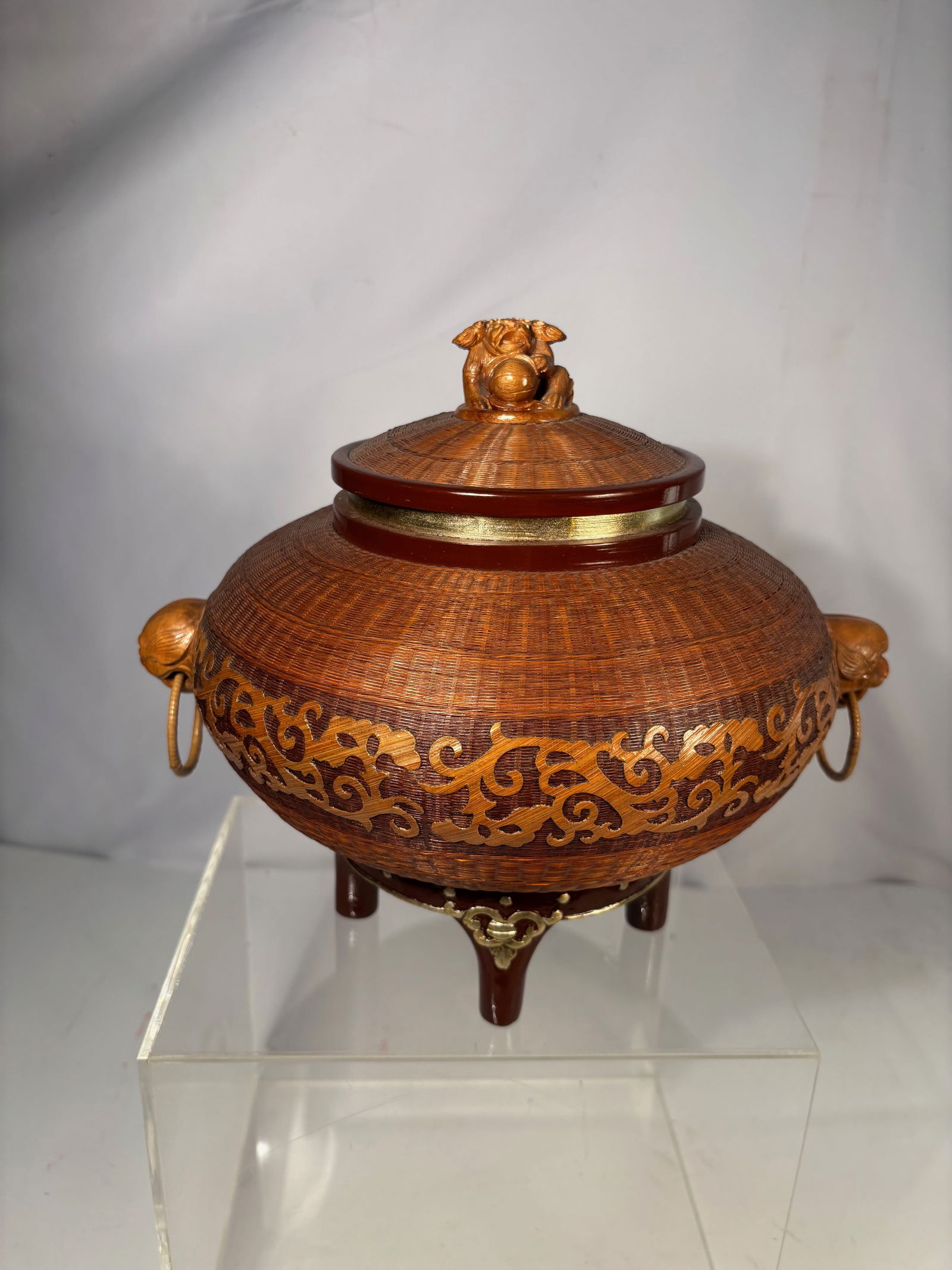 A Chinese Bamboo & Wood Form Carved Decorative Censer Box, Shanghai Handicrafts: Chinese Shanghai export decorative covered box in archaistic tripod censer form, mid-20th century.The vessel fitted with lion mask ring handles and raised on three short feet. The domed cover surmount