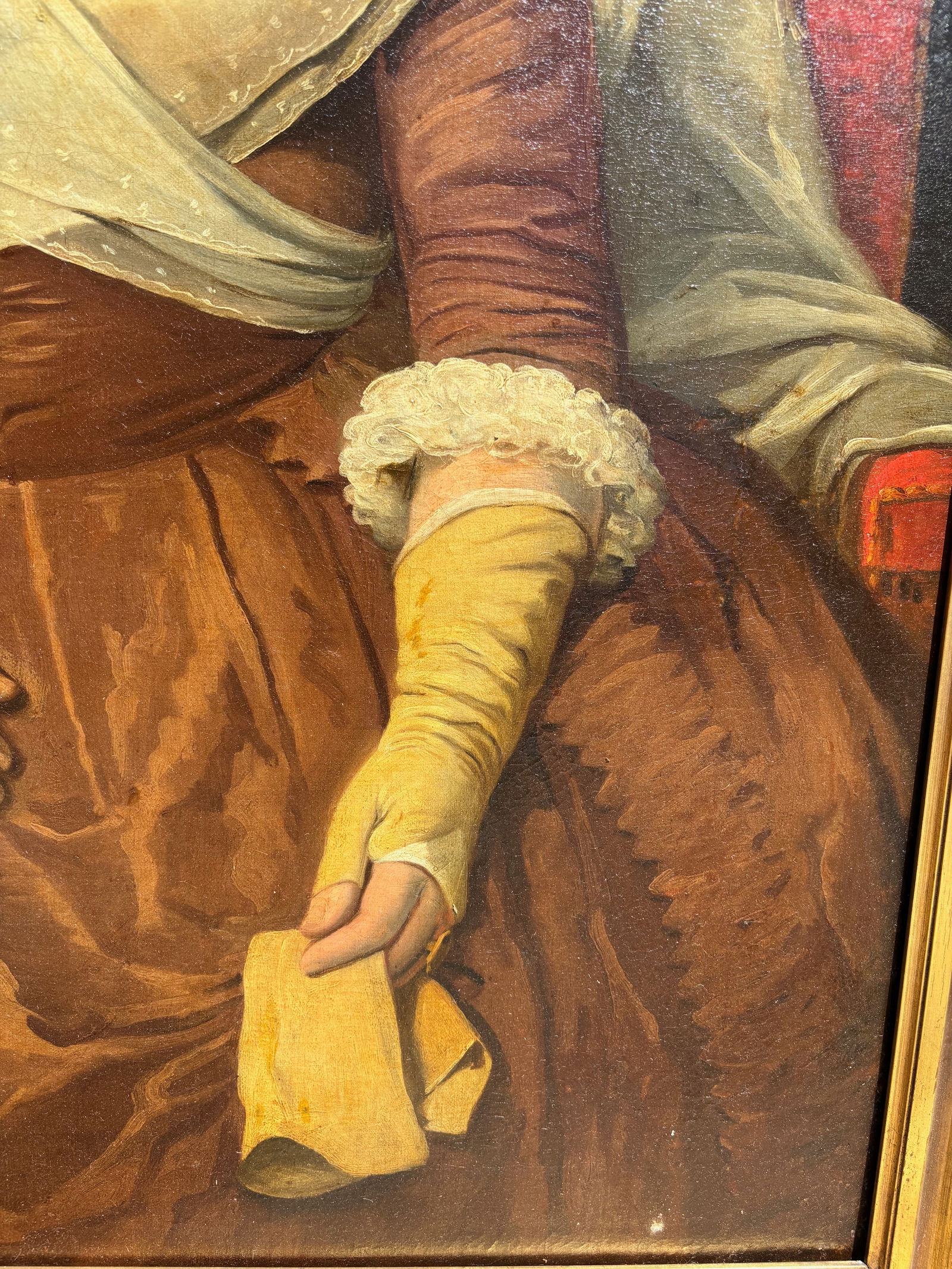 Portrait of a Seated Lady in Brown Silk Dress, 18th Century Manner: 18th century, Oil on canvas portrait depicting a dignified lady seated indoors, wearing a brown silk dress with white lace cuffs, and a layered white headwrap. She holds a yellow glove and a rolled