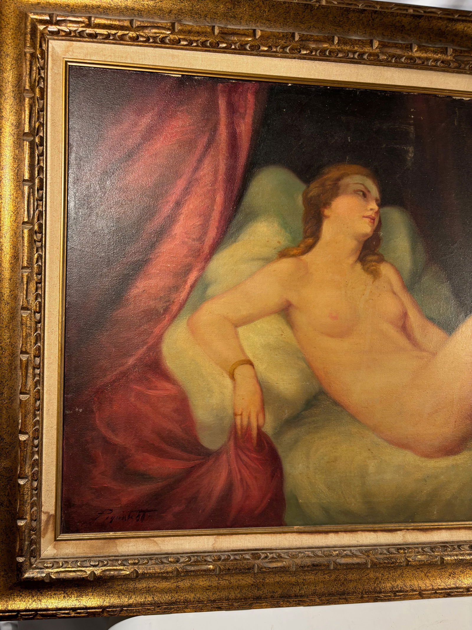 Large Signed Reclining Nude Oil Painting, 20th Century, European School, 32 x 56 in.: Large oil on canvas depicting a reclining nude woman in a classical academic style, rendered with soft modeling and rich draped background. The work is signed at lower left, though the signature is