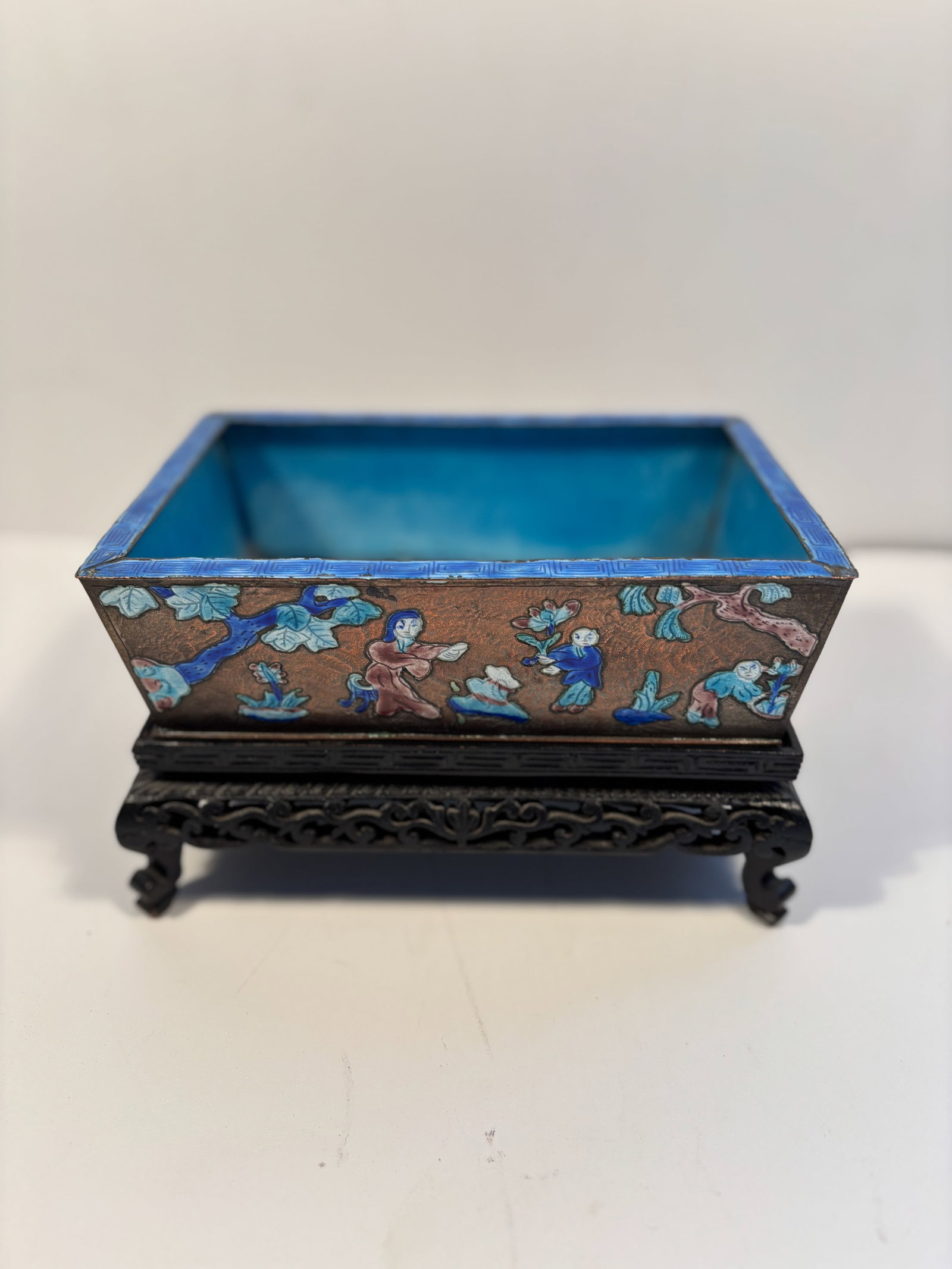 A Chinese silver enamel vase with wood base: 19th century, Dimensions?MEASURES WITH BASE: 8 INCHES X 5.5 INCHES X 4.5 INCHES