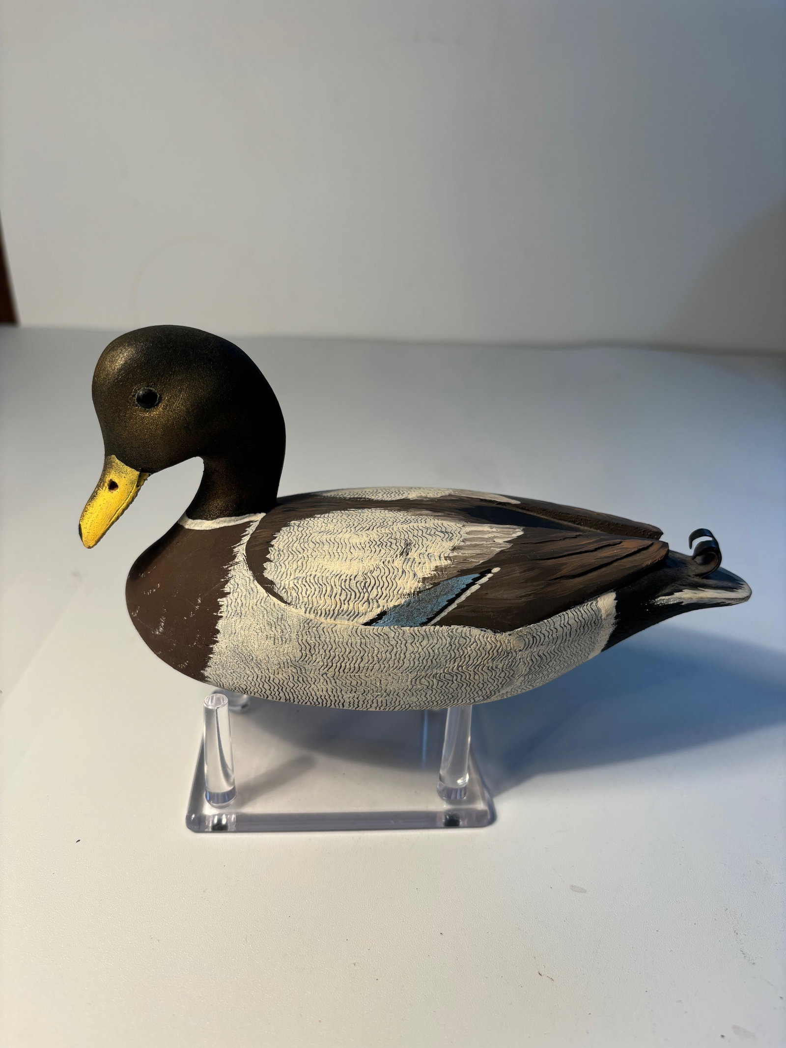 Tom Hunter carved wooden canvas back mallard drake decoy signed: A vintage hand-carved wooden mallard drake, created by Tom Hunter of Flesherton, Ontario, Canada. The artist’s signature and the bird’s description are prominently marked on the bottom. Tom Hunter