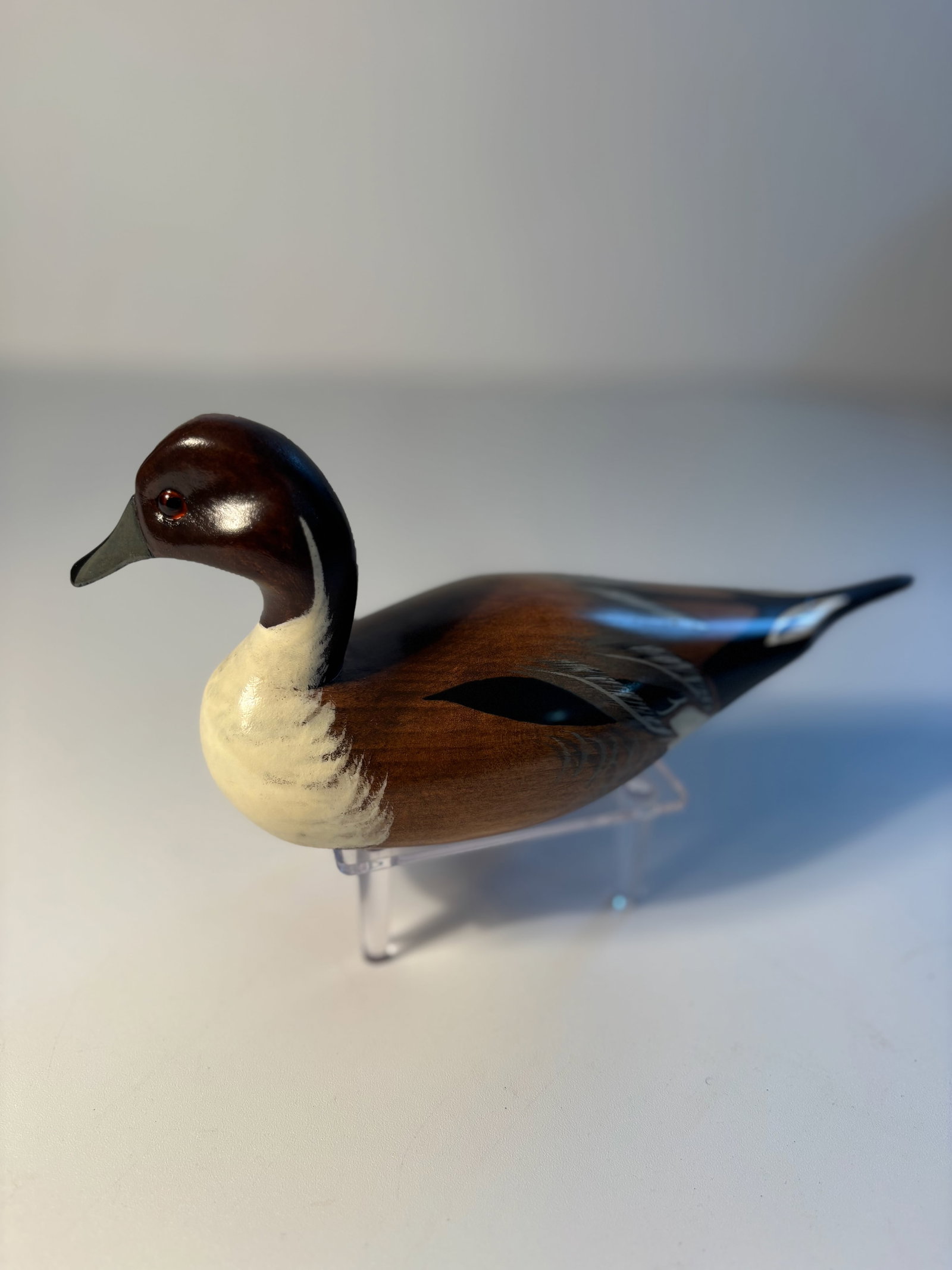 P. Korman carved " Pintail " decoy with mark: 1980's Vintage hand-carved wooden figure of a "Pintail" , signed by P. Korman and marked as “A Wooden Bird Original” by The Hadley Companies.Dimensions?8.5" x 3.5" x 3.5"