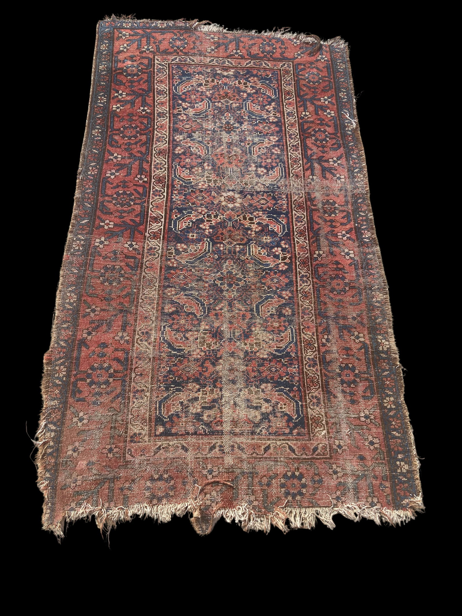 Antique Persian hand-knotted Northwest Village Rug, Malayer Kurdish Herati Pattern: This antique hand-knotted Persian village rug, likely from the Northwest Persian Malayer/Hamadan Kurdish region, features a classic all-over Herati-style floral design rendered in deep indigo, red, an