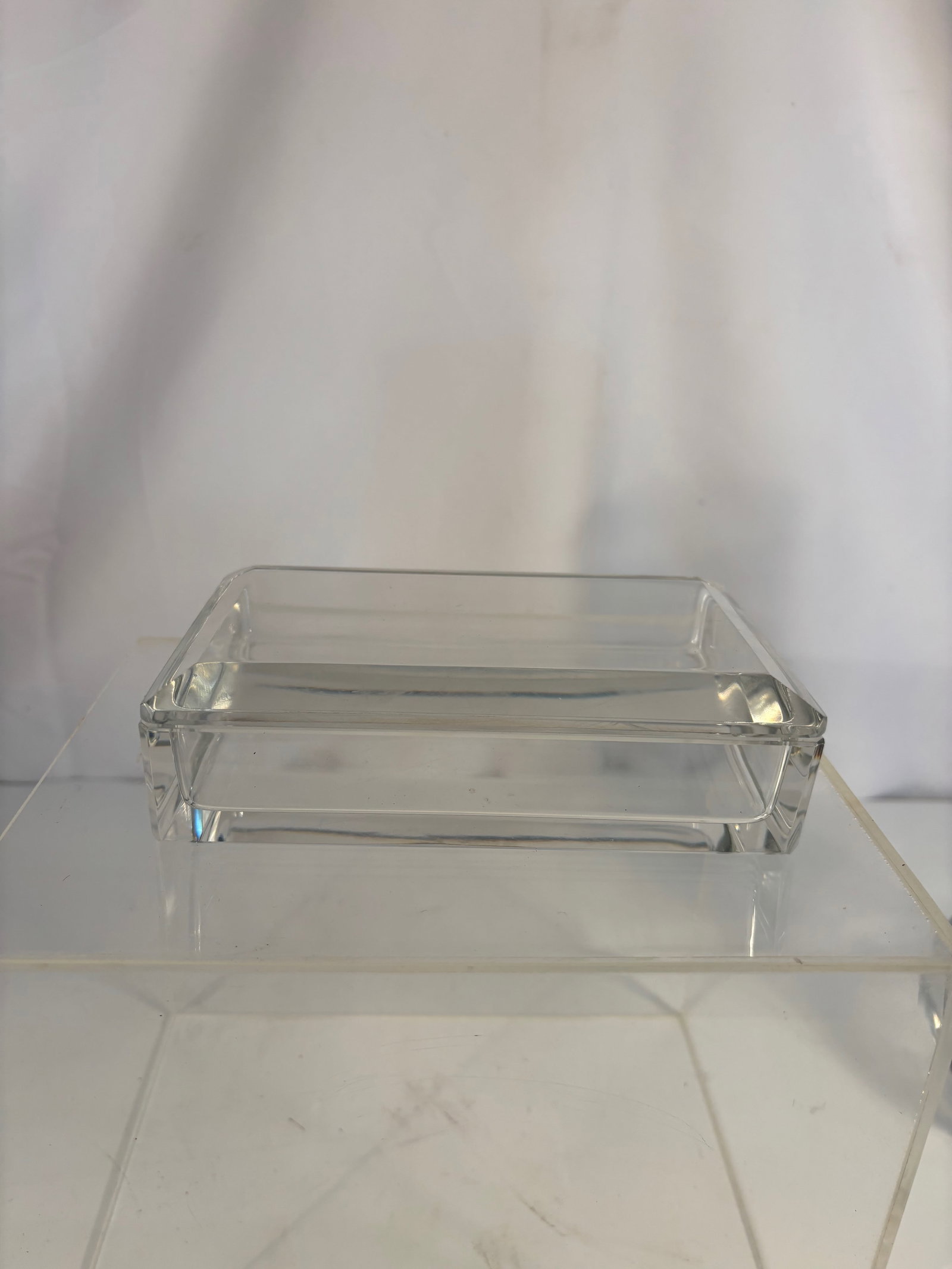 A Val Saint Lambert Modernist Rectangular Crystal Box with Cover, Signed , c. 1950–1970: A finely crafted Val Saint Lambert clear crystal covered box, mid-20th century, etched signature “Val St Lambert” to the rim. The rectangular form features heavy, high-lead crystal of exceptio