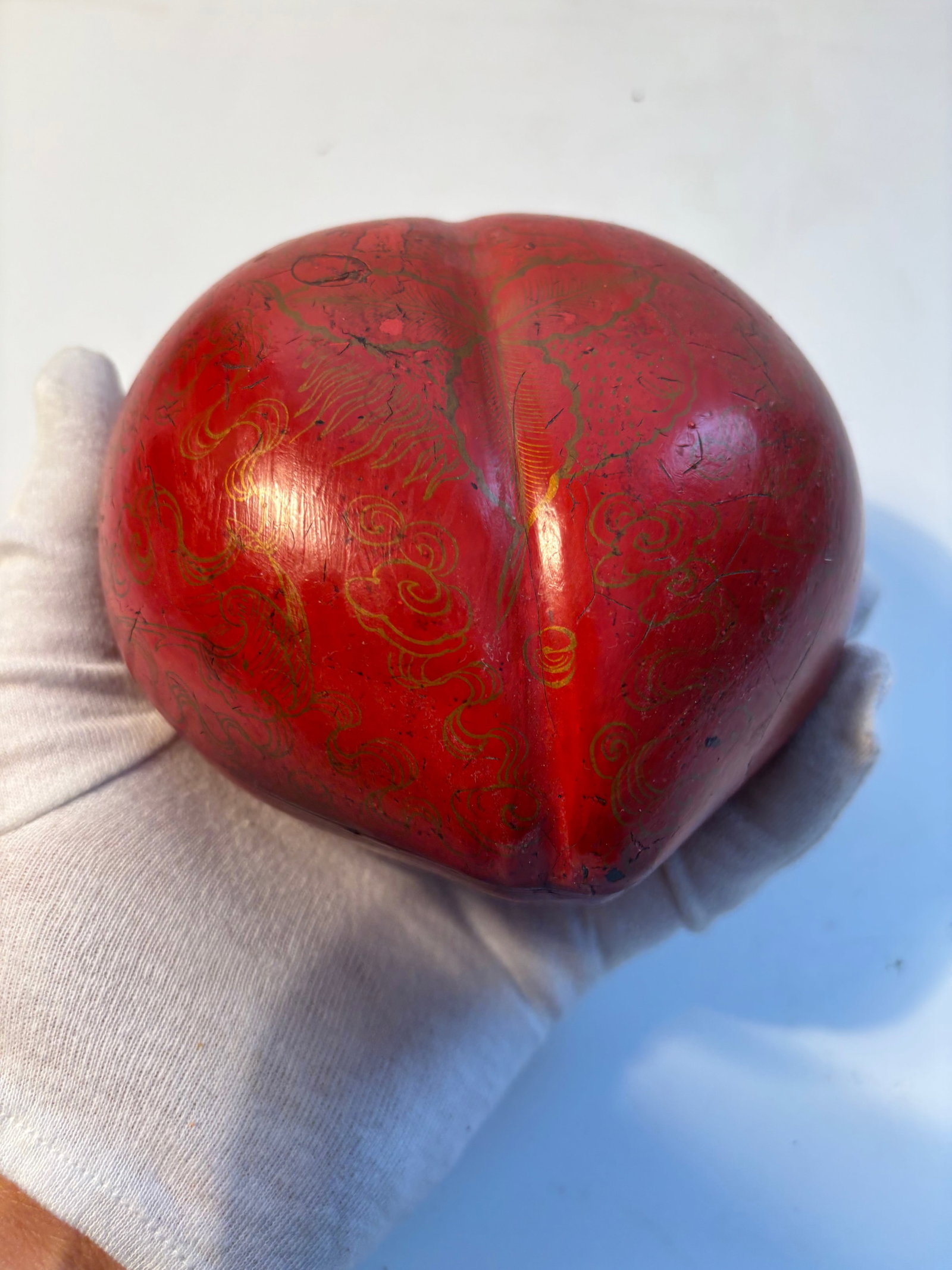 A Chinese red lacquer peach box: 19th century, Dimensions?Length: 5.5 inches
