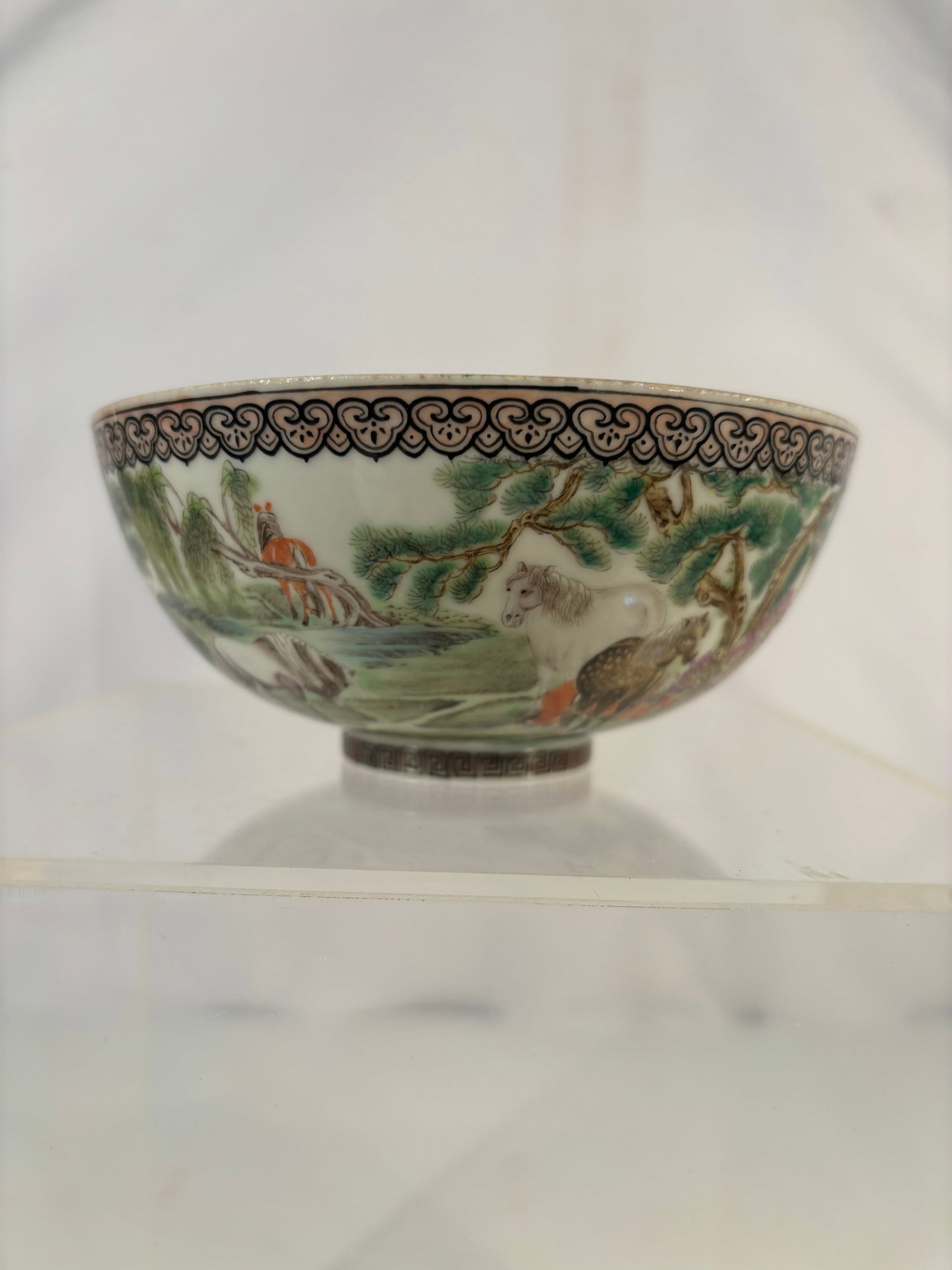 A Chinese Eggshell Porcelain Eight Horses Bowl With Qianlong Mark: A finely potted Chinese eggshell porcelain bowl, delicately formed with an exceptionally thin translucent body. The exterior is hand-painted in famille rose enamels with a continuous Eight Horses land