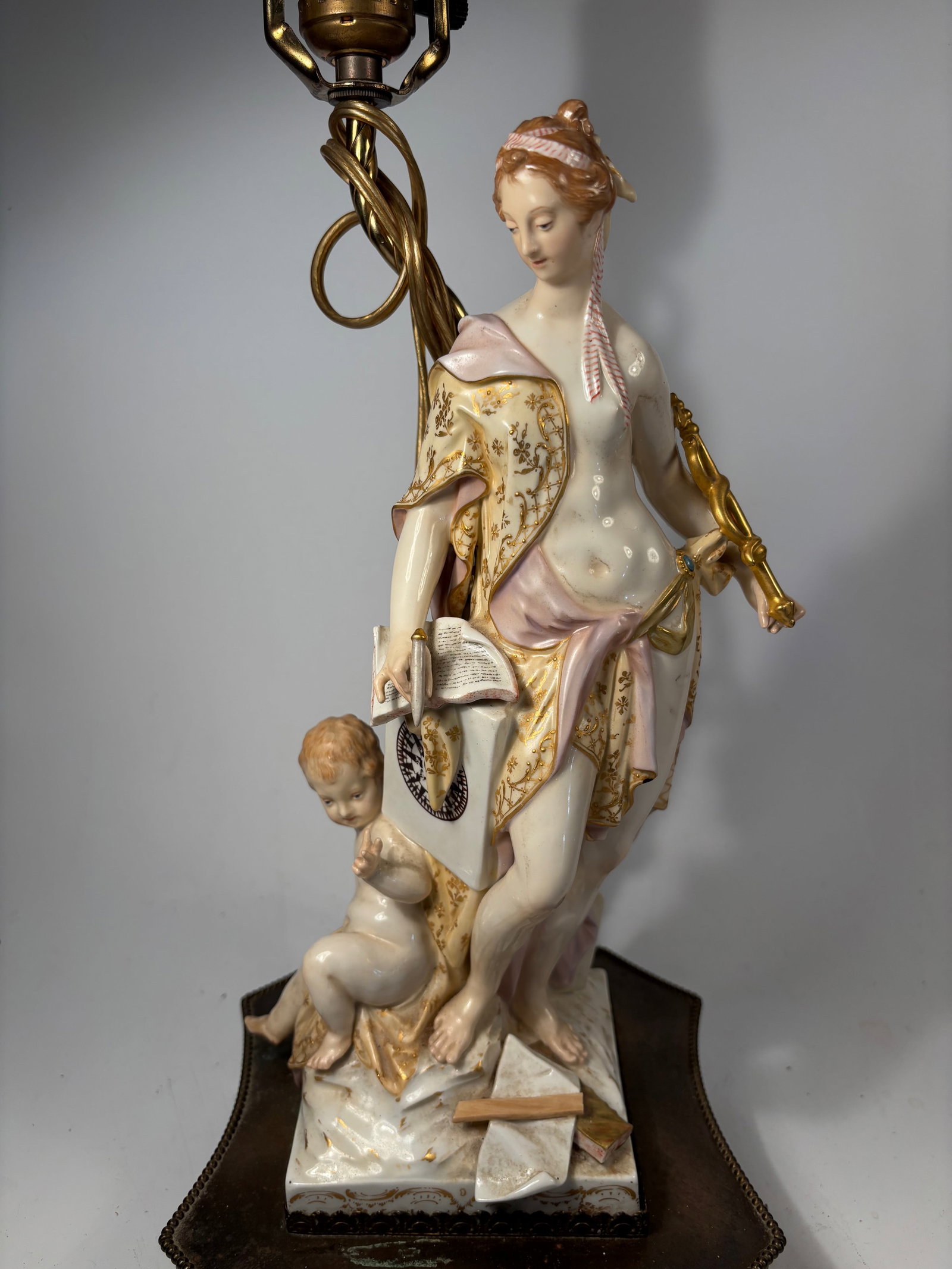 One of Royal Dux Allegorical Porcelain Figures – Art and Science, circa 1900: Late 19th to early 20th century ; One of finely modeled and hand-painted porcelain allegorical figures representing “Art” and “Science,” attributed to Royal Dux, Bohemia, circa 1900. E