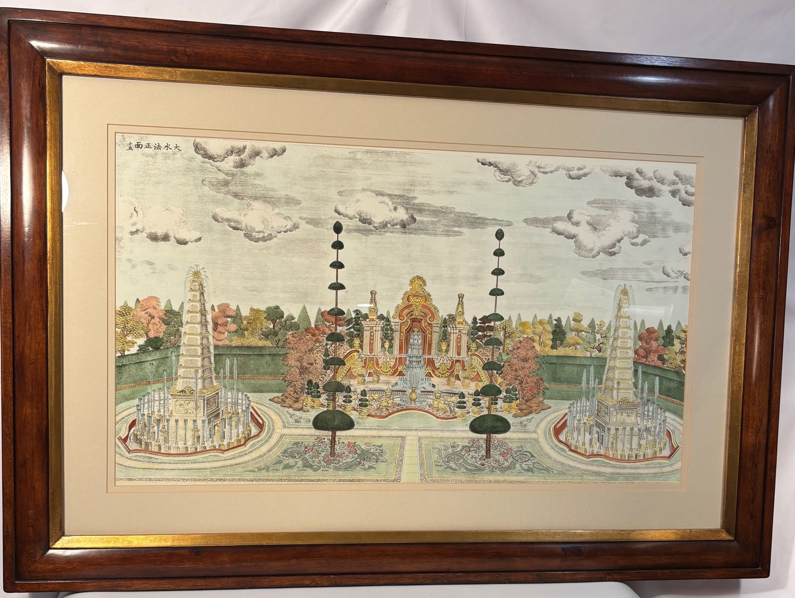 A Large Chinese Yuan Ming Yuan Great Fountain (Dashuifa) Color Engraving: 19th century, Color engraving depicting the Dashuifa (Great Fountain) of the Yuan Ming Yuan (Old Summer Palace), The image shows the elaborate Western-style pavilions, fountains, and landscaped ground