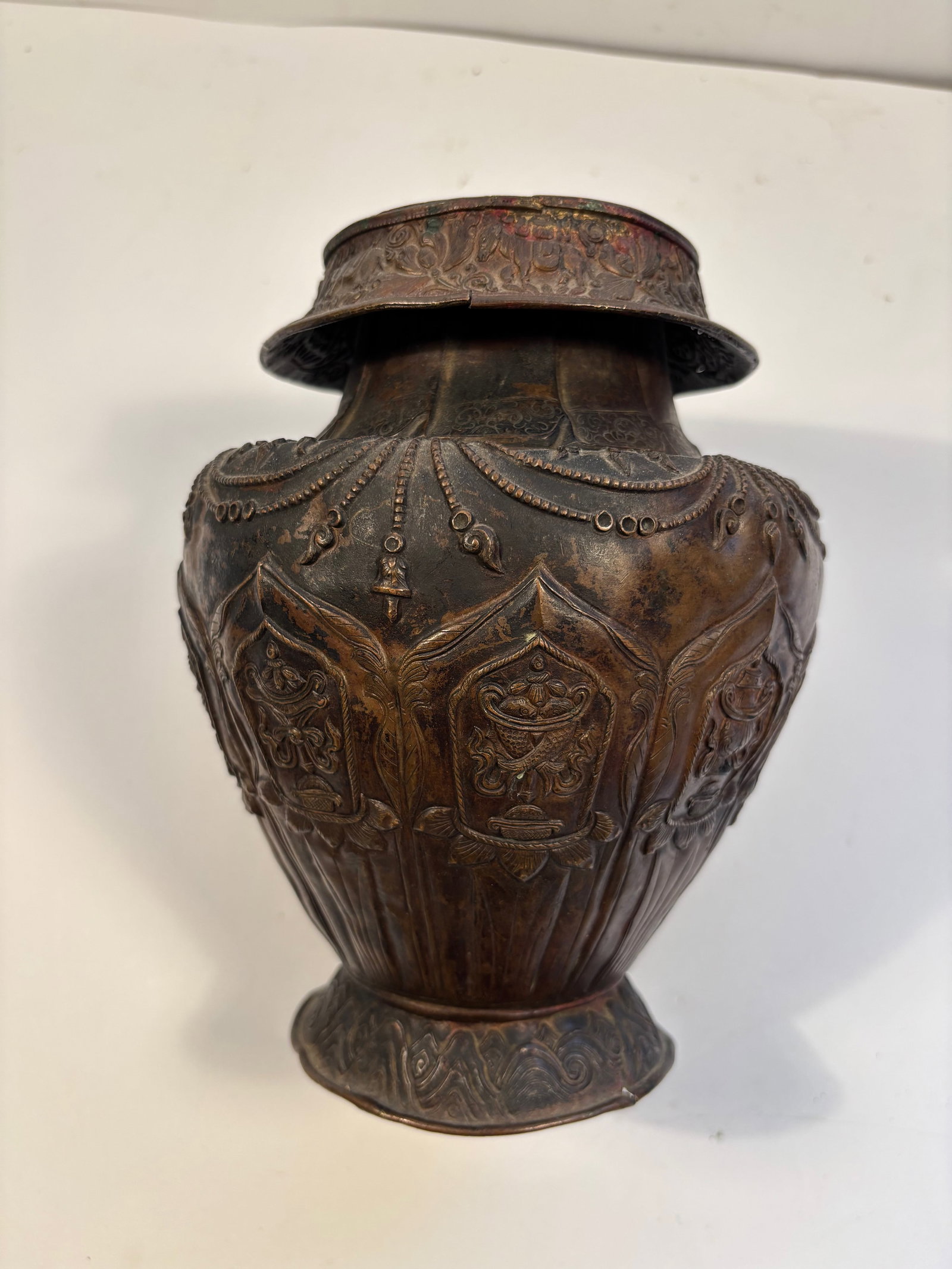 A Tibetan copper vase with hand etced Hidden Eight Immortals: 19th Century, Dimensions?Height: 8 inches