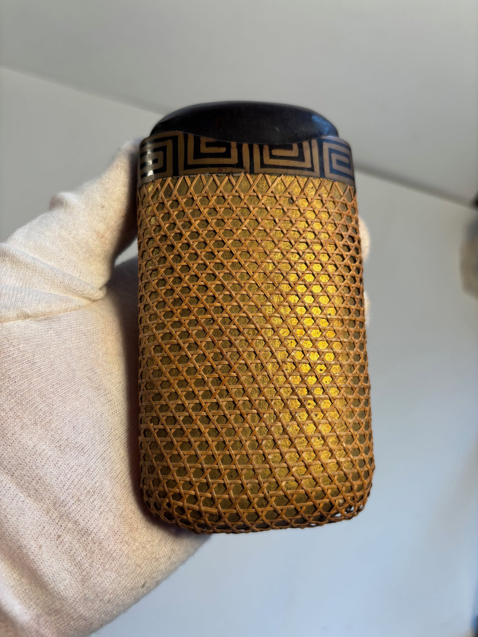 A Japanese gilted Lacquered cigar case: Meiji-era , crafted with urushi lacquer and possibly maki-e (gold powder decoration), The main body is woven bamboo, likely hand-crafted in a fine hexagonal or “asa-no-ha” (hemp leaf) pattern.