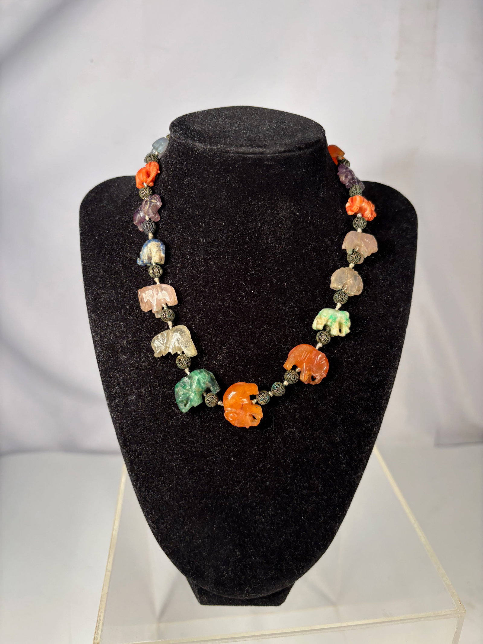 A Multi-Stone Carved Elephant Necklace with Coral, Jadeite and Rock Crystal, 18 Elephants (1 of 11)
