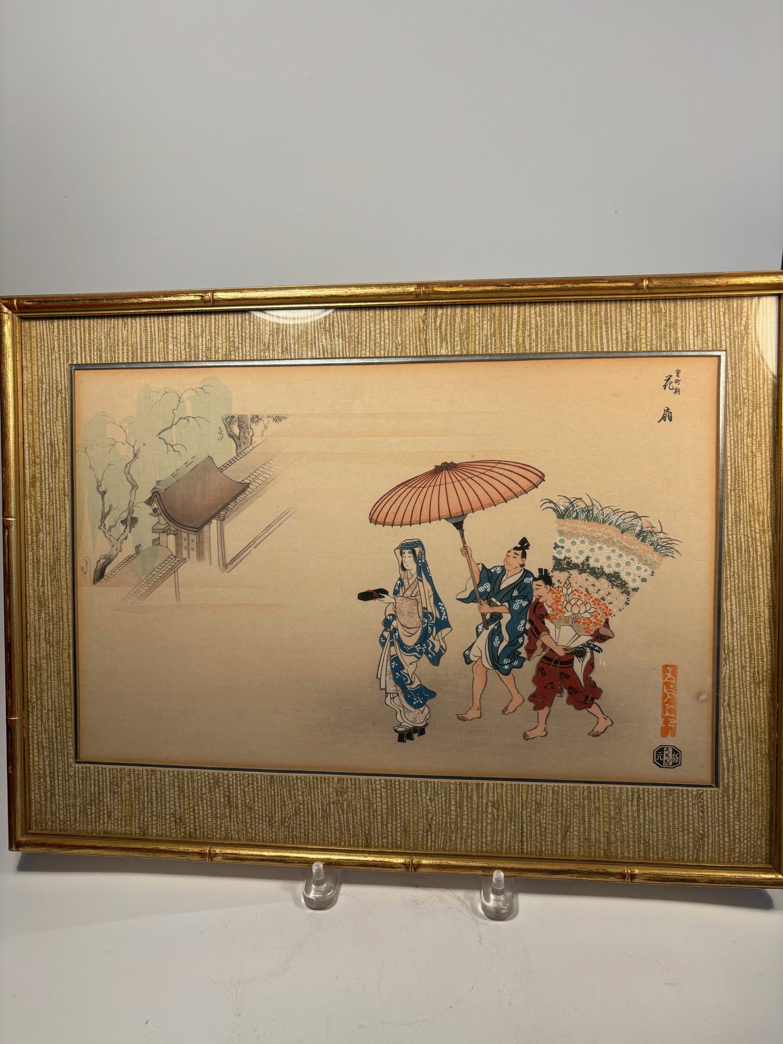 A Japanese woodblock print signed: Likely a Taisho-era (early 1900s); A finely detailed Japanese woodblock print. depicting a procession of Heian-period courtiers escorting a noblewoman. The central figures are dressed in traditional