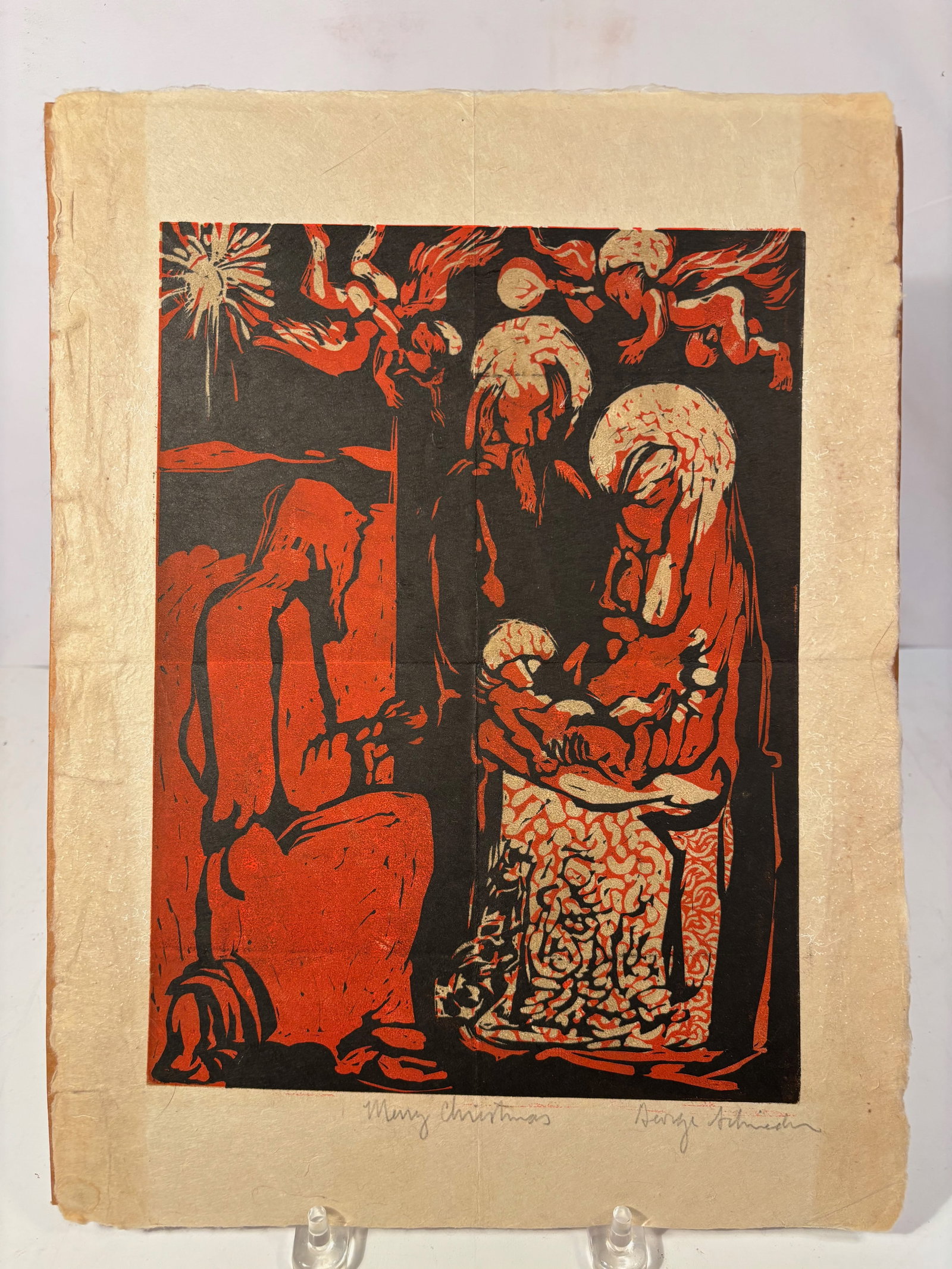 George Paul Schneider (American, Chicago) “Merry Christmas?? Nativity Scene Color Linocut: A signed color relief print on paper by George Paul Schneider (American, Chicago), pencil titled Merry Christmas in the lower center margin. The composition presents a striking modernist Nativity scen