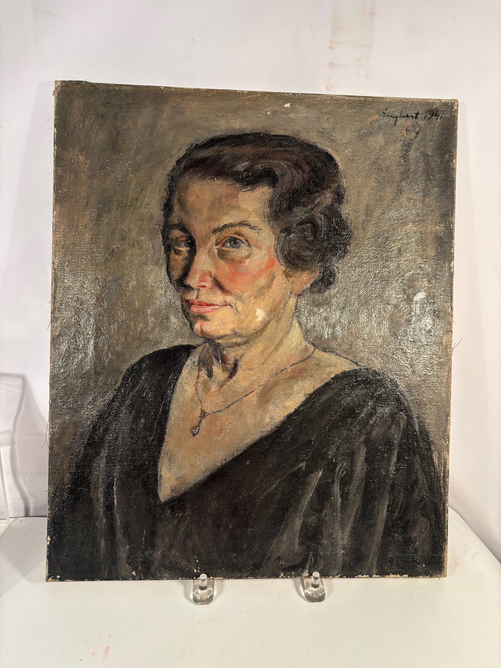A German School Portrait Oil Painting, Signed Englent, Dated 1941: Oil on canvas portrait depicting a woman, executed in expressive brushwork with warm tonal modeling. Signed "Englent” and dated 1941 in the upper corner. Height: 18 inches; Length: 15 inches.