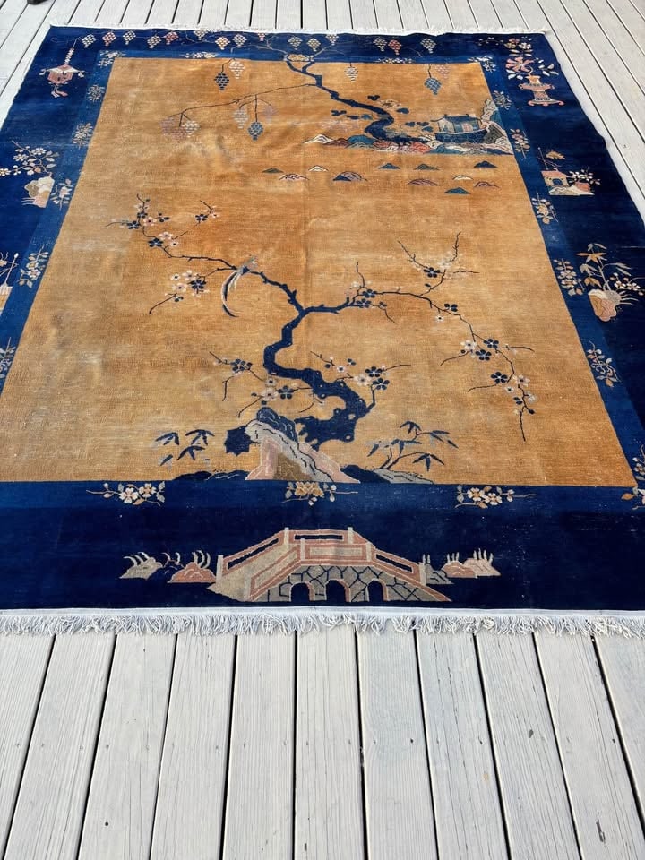 Antique Chinese Peking Art Deco Rug, Scenic Landscape, Gold Field & Blue Border: Antiuqe Chinese Peking Art Deco rug featuring a refined scenic landscape design. The gold field is decorated with stylized trees, water, and architectural elements, framed by a deep cobalt blue border