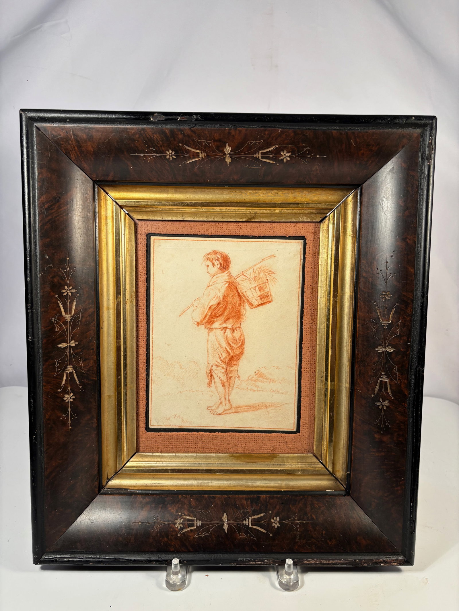 Continental School (19th Century) , Study of a Boy Carrying a Basket , Red chalk (sanguine) on: A finely rendered study in sanguine chalk depicting a barefoot boy walking away, carrying a wicker basket on his back and a stick over his shoulder. The artist captures the natural posture and rustic 