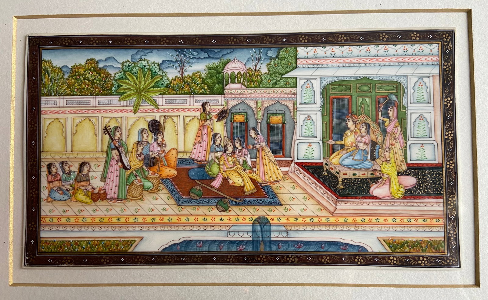 Indian Mughal Palace Interior Miniature Painting, Hand-Painted,: 19th century, Hand-painted Indian Mughal-style miniature depicting a palace interior scene with elegantly dressed ladies, attendants, and musicians engaged in courtly activities. Executed in opaque wa