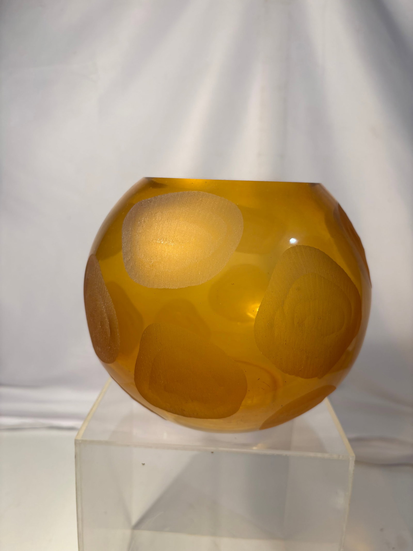 Mid-Century Amber Art Glass Vase: Hand-blown amber art glass vase with rounded organic form and frosted circular decoration throughout. Having a polished pontil base and modernist design influenced by Scandinavian and Murano studio gl