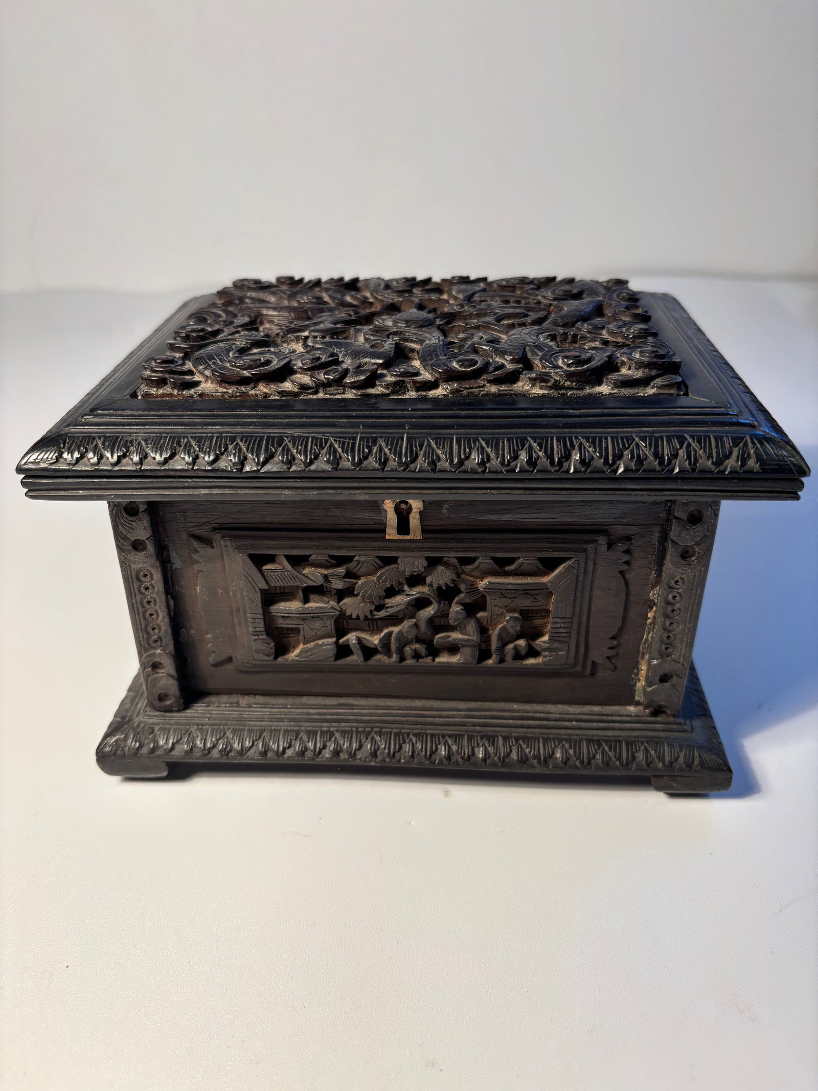 A Chinese hand carved "Dragon" ZiTAN WOOD BOX: Qing Dynasty (1644-1912); This appears to be a highly detailed and ornately carved box, possibly made of Zitan wood.Dimensions? 7 INCHES X 5 INCHES X 4 INCHES