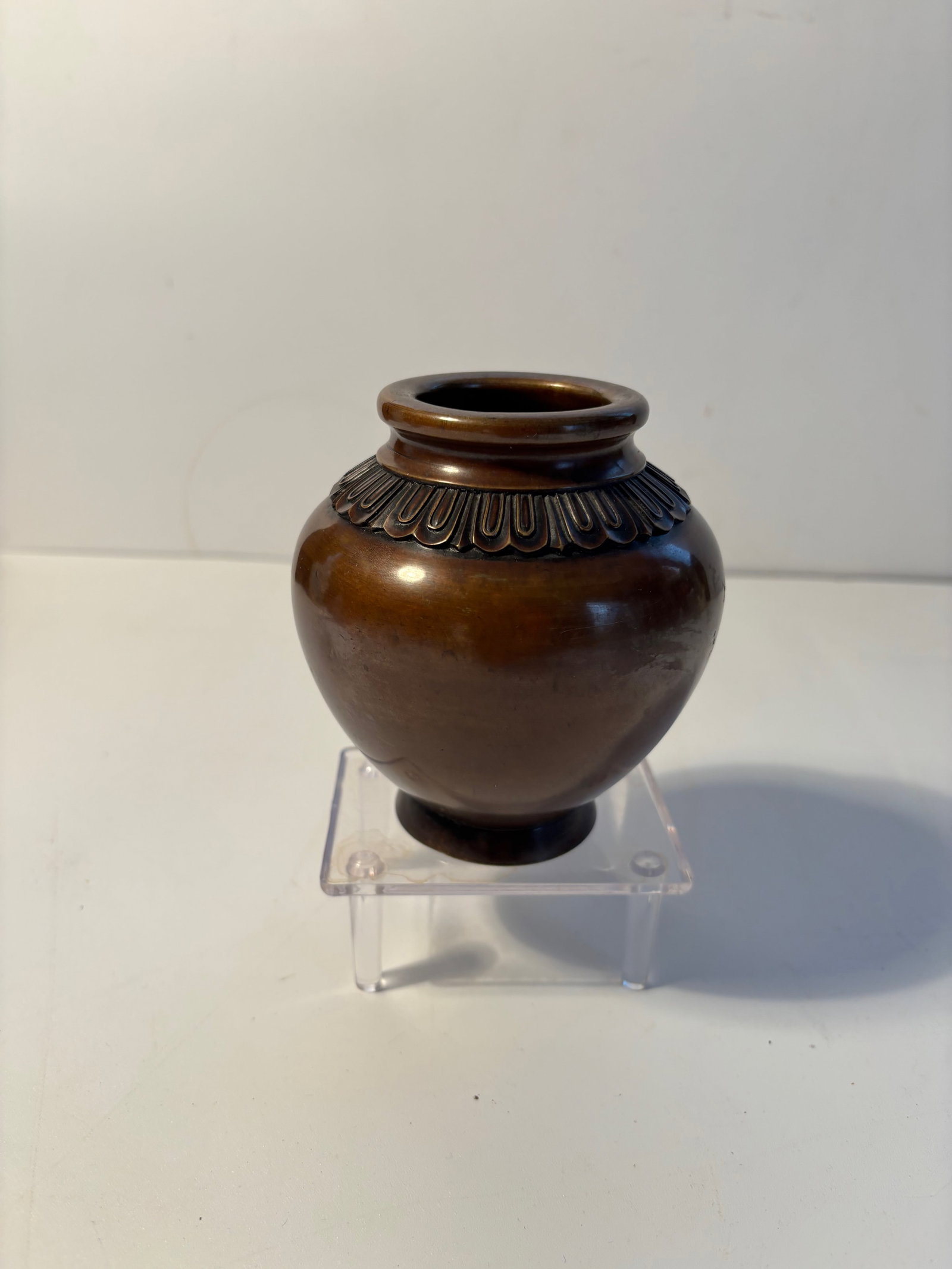 A Chinese ritual-style bronze vessel: Qing Dynasty (1644-1912), Round body with a short neck and flared mouth—very similar to a lotus jar, water vessel, or incense container ,nice old patina.Dimensions? Height: 4.25 INCHES