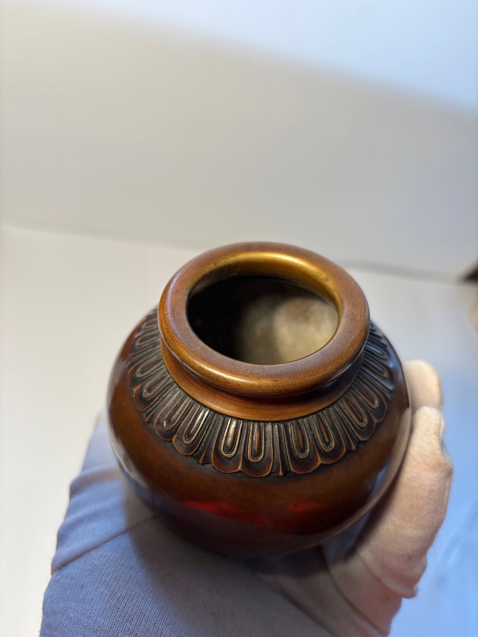 A Chinese ritual-style bronze vessel: Qing Dynasty (1644-1912), Round body with a short neck and flared mouth—very similar to a lotus jar, water vessel, or incense container ,nice old patina.Dimensions? Height: 4.25 INCHES