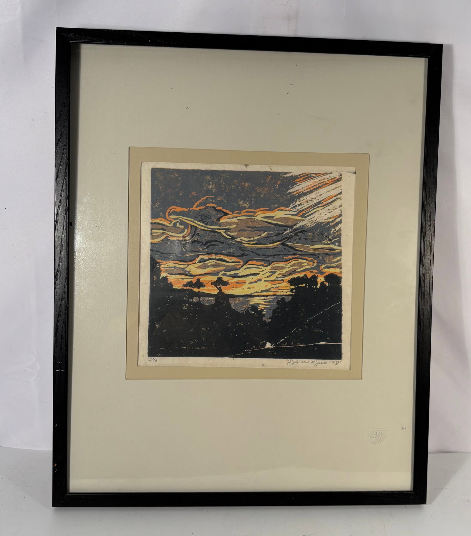 Deborah Marie Jost 1998 Reduction Woodcut Sunset Landscape, 2/10: A striking original reduction woodcut print by Chicago printmaker Deborah Marie Jost, signed and dated 1998 lower right and numbered 2/10 lower left. The composition depicts a dramatic sunset sky over