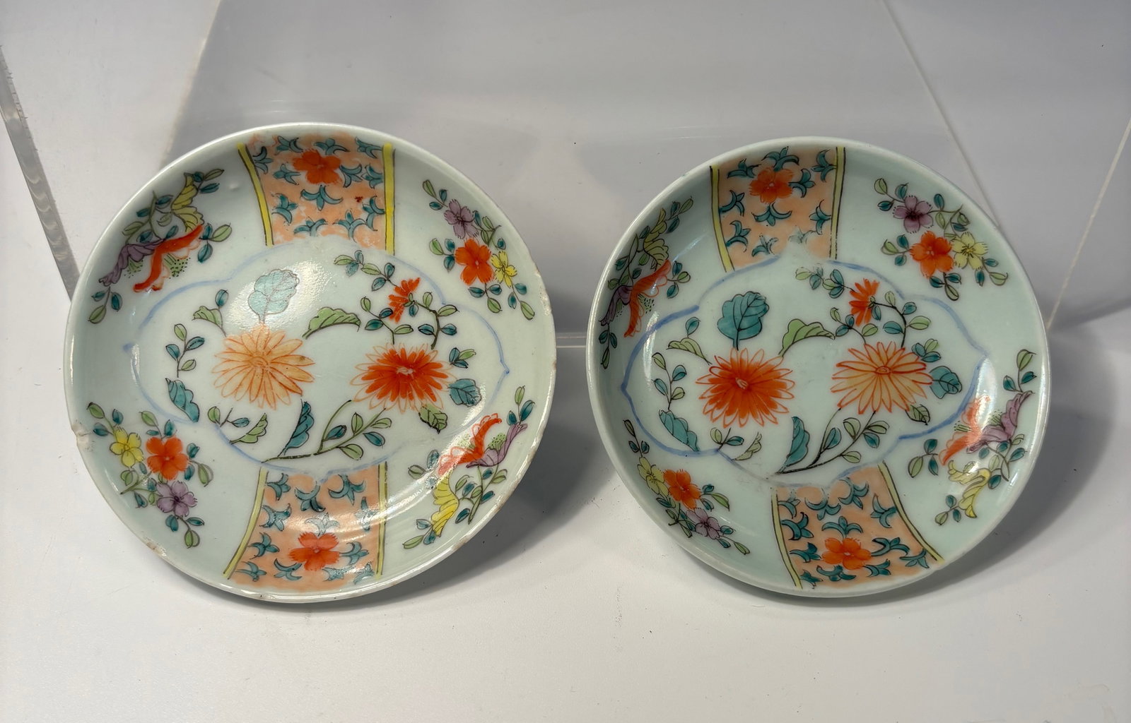 Pair of Chinese Export Porcelain Famille Rose Dishes, Floral Decoration, Red ‘CHINA’ Mark: Qing Dynasty(1644-1912),A pair of Chinese export porcelain famille rose dishes, each finely painted with floral sprays and butterflies reserved in patterned panels, in vibrant famille rose enamels. Th