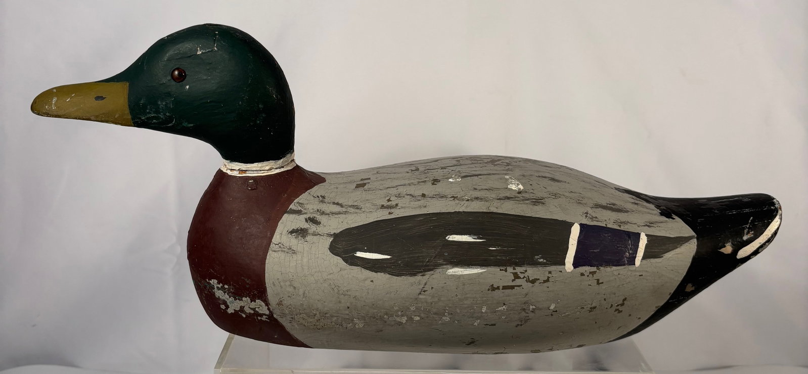 Vintage Hand-Carved and Painted Wooden Mallard Drake Decoy, Marked “NH: Hand-carved and painted wooden mallard drake decoy, mid-20th century, impressed “NH” mark to the underside. Possibly denoting New Hampshire origin or the initials of the maker. The decoy retai