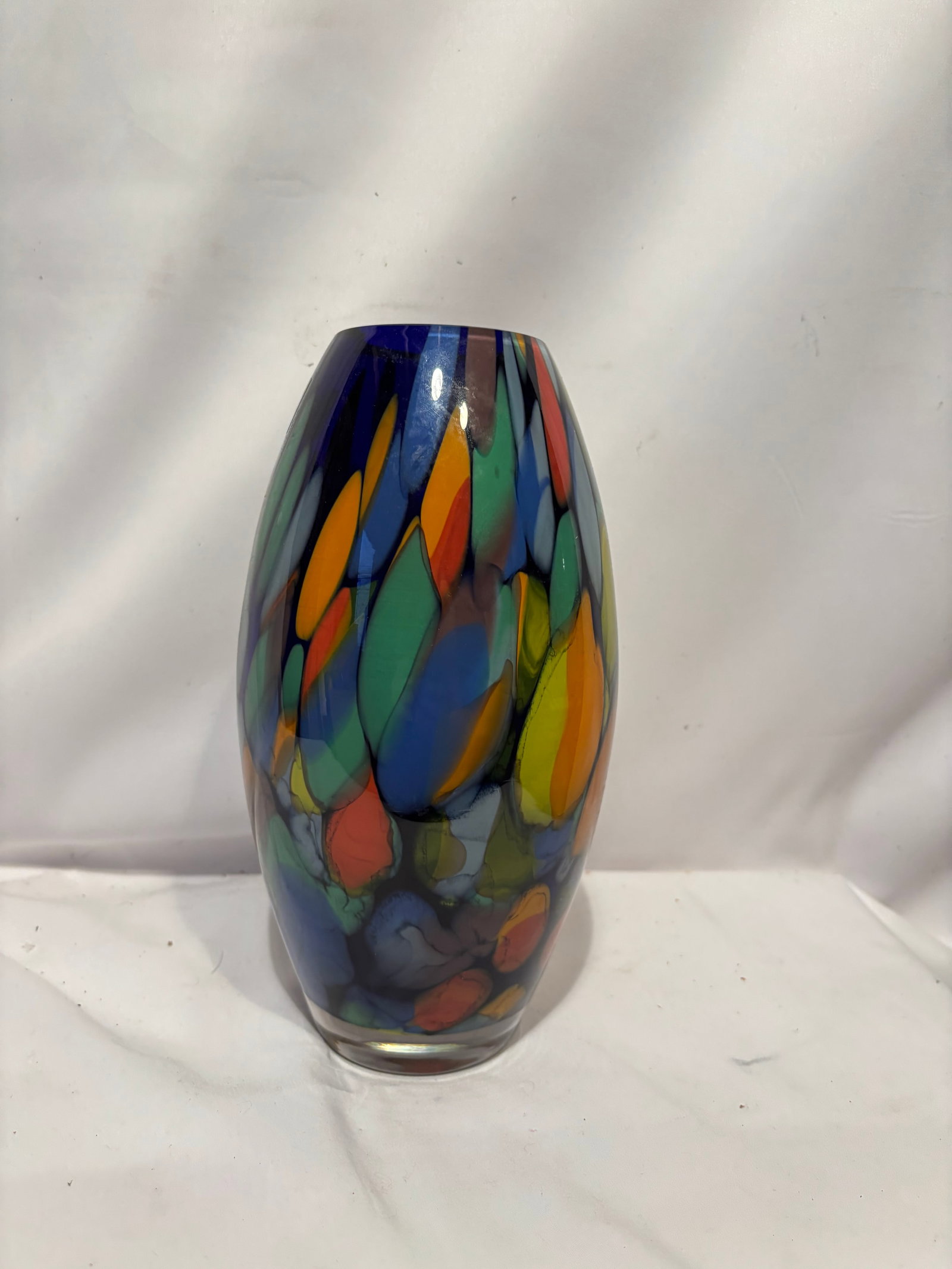 Makora Krosno Polish Hand Blown Art Glass Vase: Handmade art glass vase by Makora of Krosno, Poland. Featuring a vibrant multicolor abstract design with layered blue, green, yellow, orange, and red decoration encased within clear glass. The oval-bo