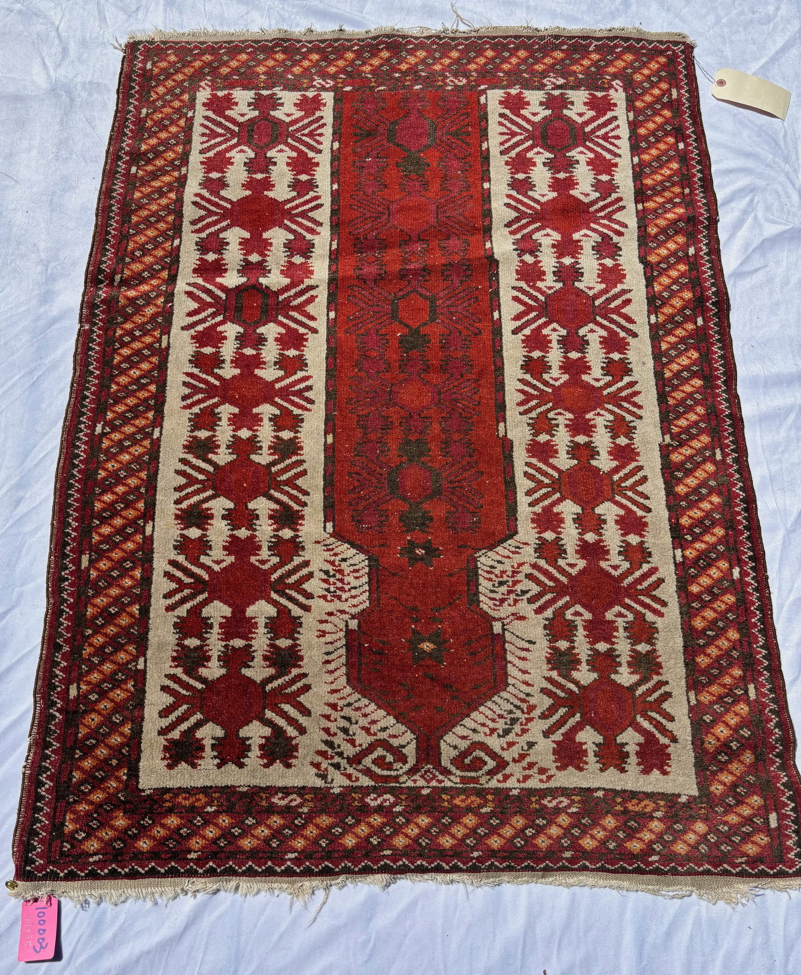 Tribal Caucasian Style Prayer Rug 49 x 35 in.: Hand-knotted wool prayer rug featuring a striking geometric niche design in deep red, ivory, and burgundy tones with stylized tribal motifs and patterned borders. Bold symmetrical composition characte