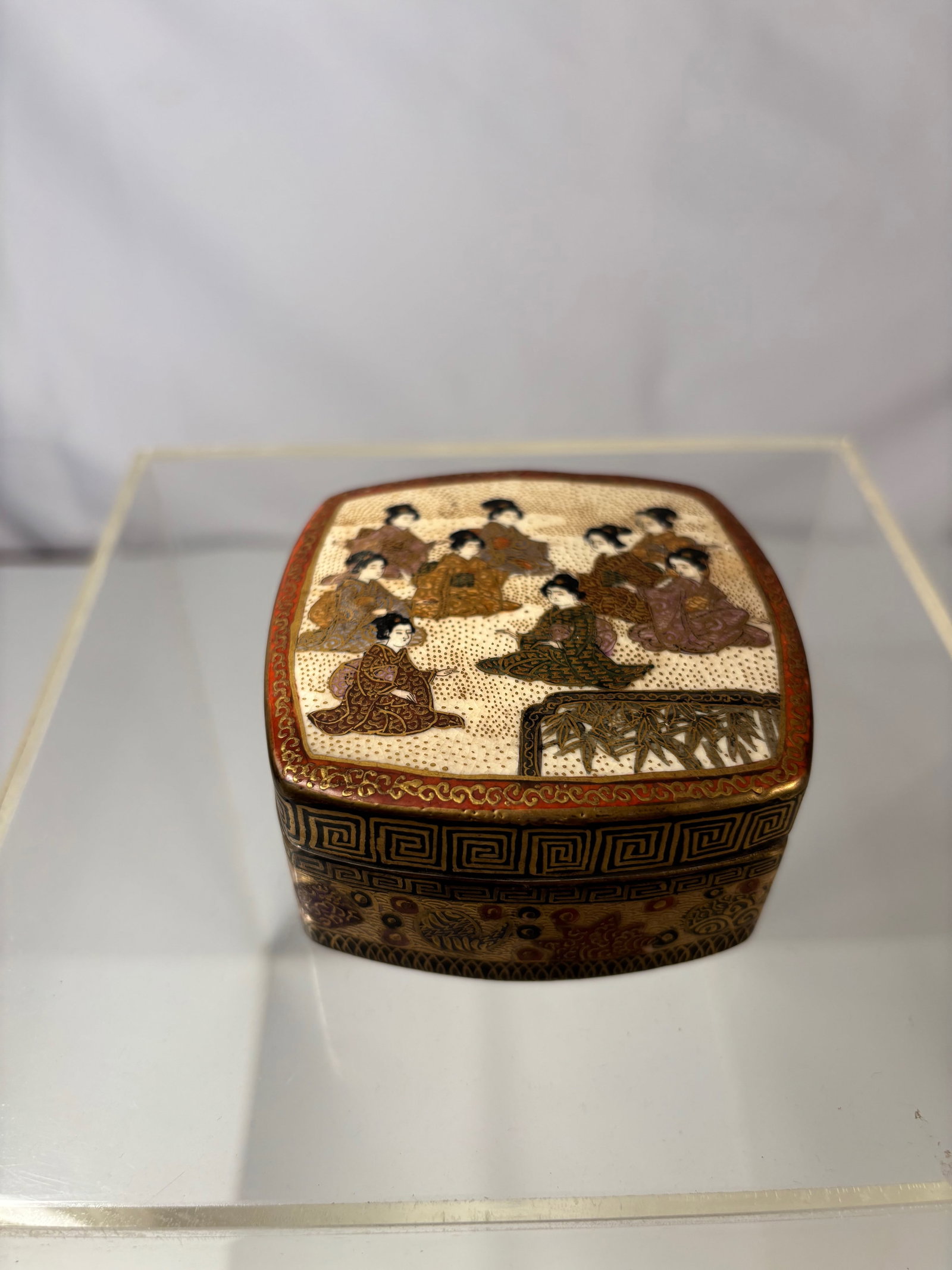 A Satsuma Koro, Signed Hododa, Meiji Period (1868-1912): Meiji period (1868–1912); The lid is decorated with a finely detailed group of court ladies (bijin) in elaborate kimonos, executed in the typical Satsuma millefleur (fine dot) and gold overglaze ena