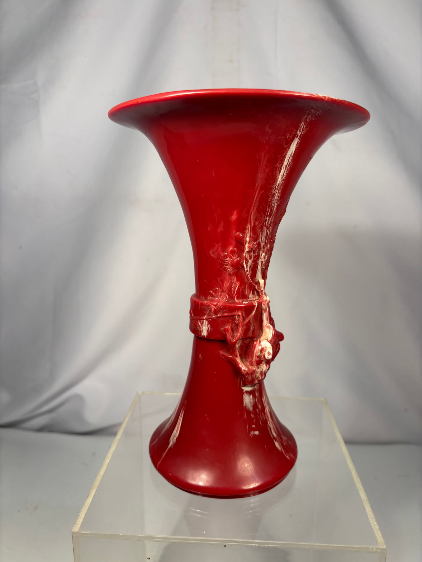 Chinese Red Resin Bamboo Motif Trumpet Vase: Chinese decorative resin vase featuring a vibrant red finish, flared trumpet rim, and elegant baluster-form body. The neck is adorned with molded bamboo stalk and leaf motifs in relief, representing r