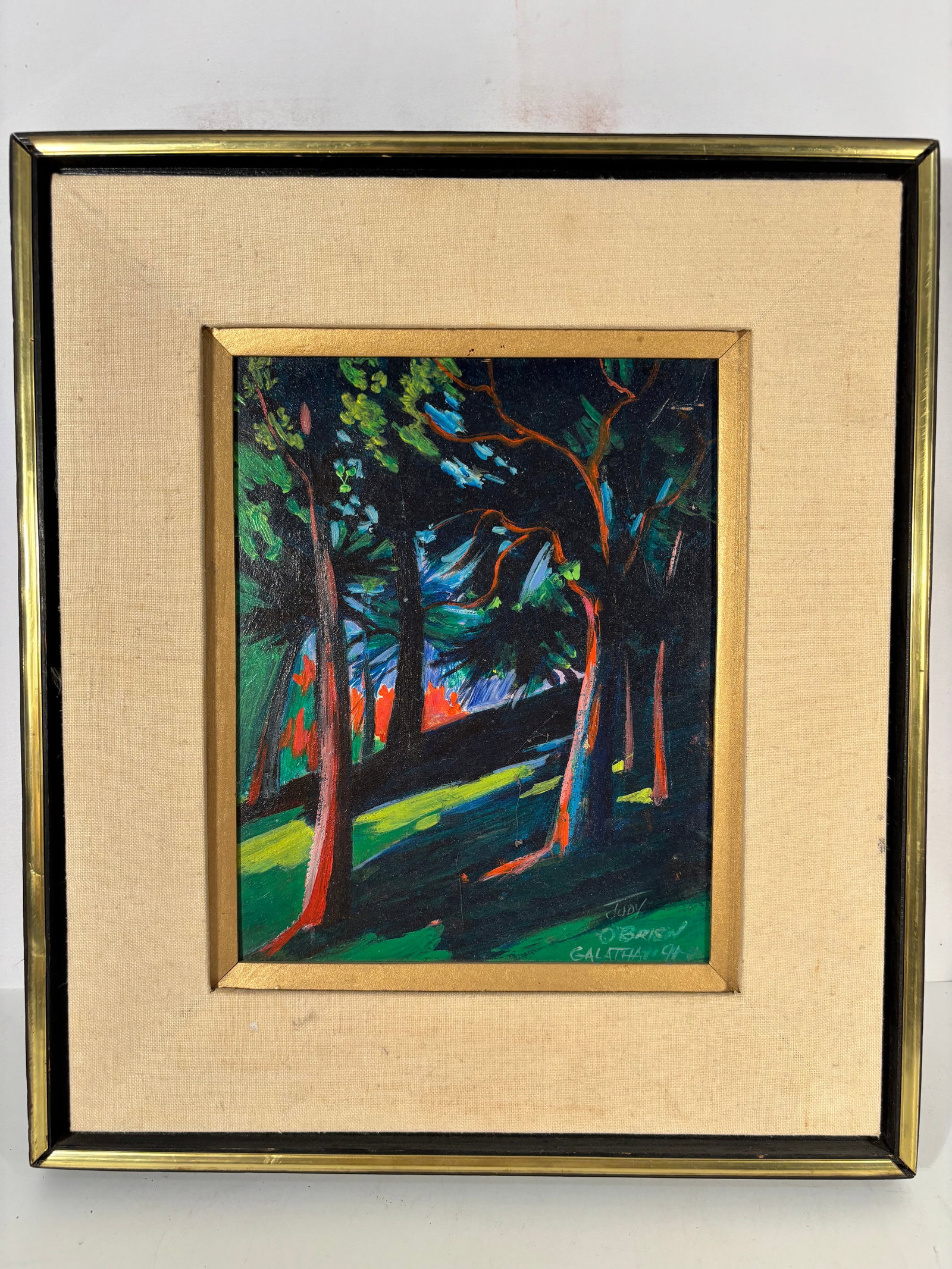 Judy O’Brien Galatha Botanical Gardens Chicago Landscape, 1991: A vibrant signed landscape by Judy O’Brien Galatha, dated 1991, depicting a wooded path scene inspired by the Botanical Gardens, Chicago, Illinois, as inscribed verso. Executed in bold expressionist