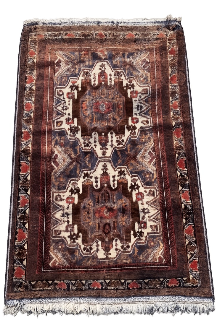 Antique Hand-Knotted Caucasian Style Tribal Rug 56 x 35 in.: Antique hand-knotted tribal rug featuring bold geometric medallions on a deep navy and brown field with ivory and rust accents. Decorated with angular motifs and geometric borders in the manner of Cau