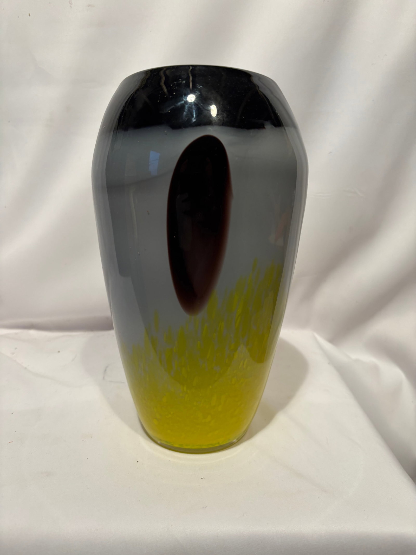 Contemporary Studio Art Glass Vase with Applied Oval Decoration: Contemporary hand-blown art glass vase featuring a striking combination of smoky gray, black, and vibrant yellow tones. The vessel is decorated with large applied oval motifs and a textured bubble-fil