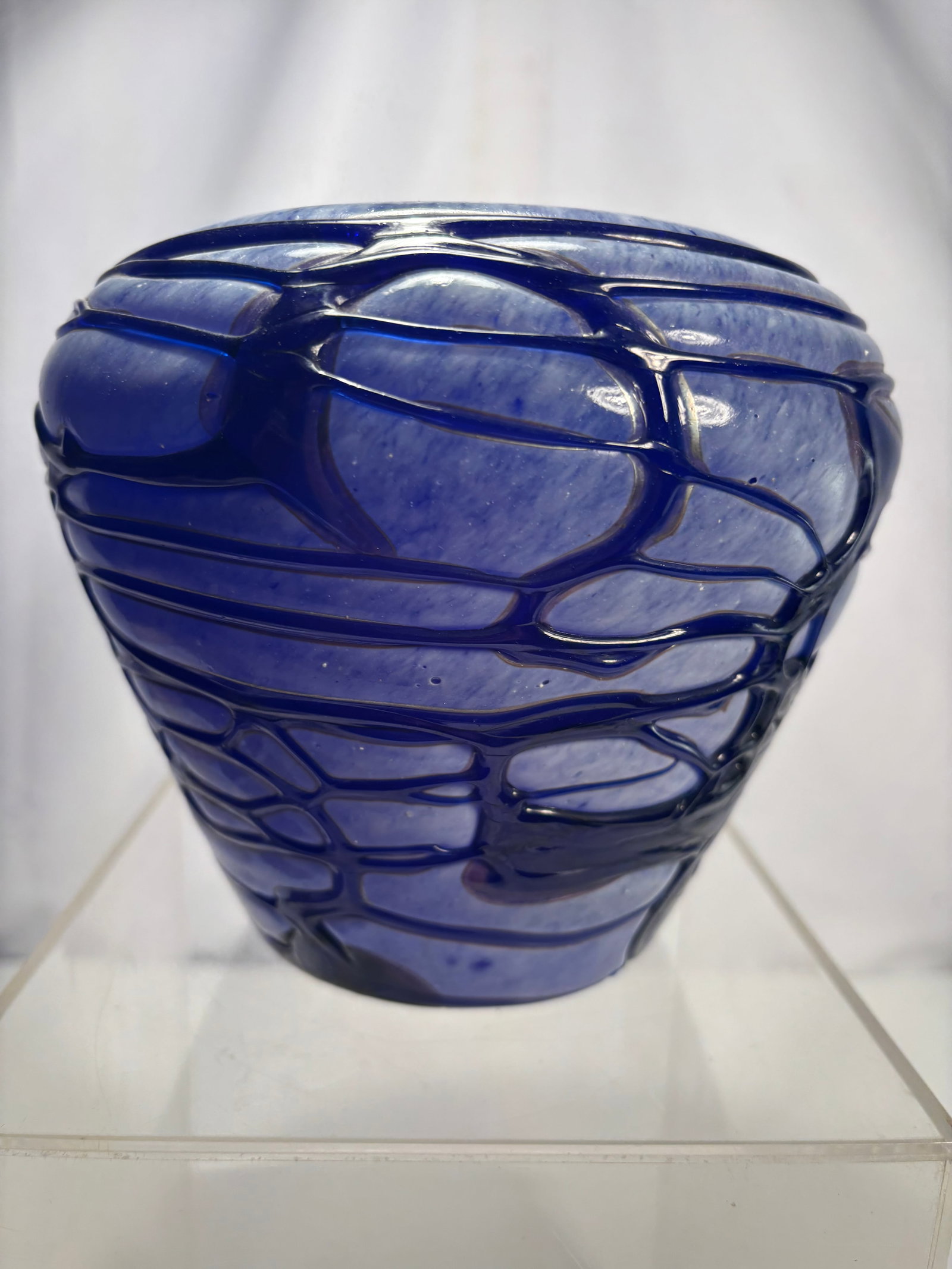 Hand Blown Blue Art Glass Vase with Applied Cobalt Trails: Hand-blown contemporary art glass vase featuring a translucent light blue body with applied cobalt blue trailing decoration in an abstract organic pattern. Thick-walled construction with a wide flared