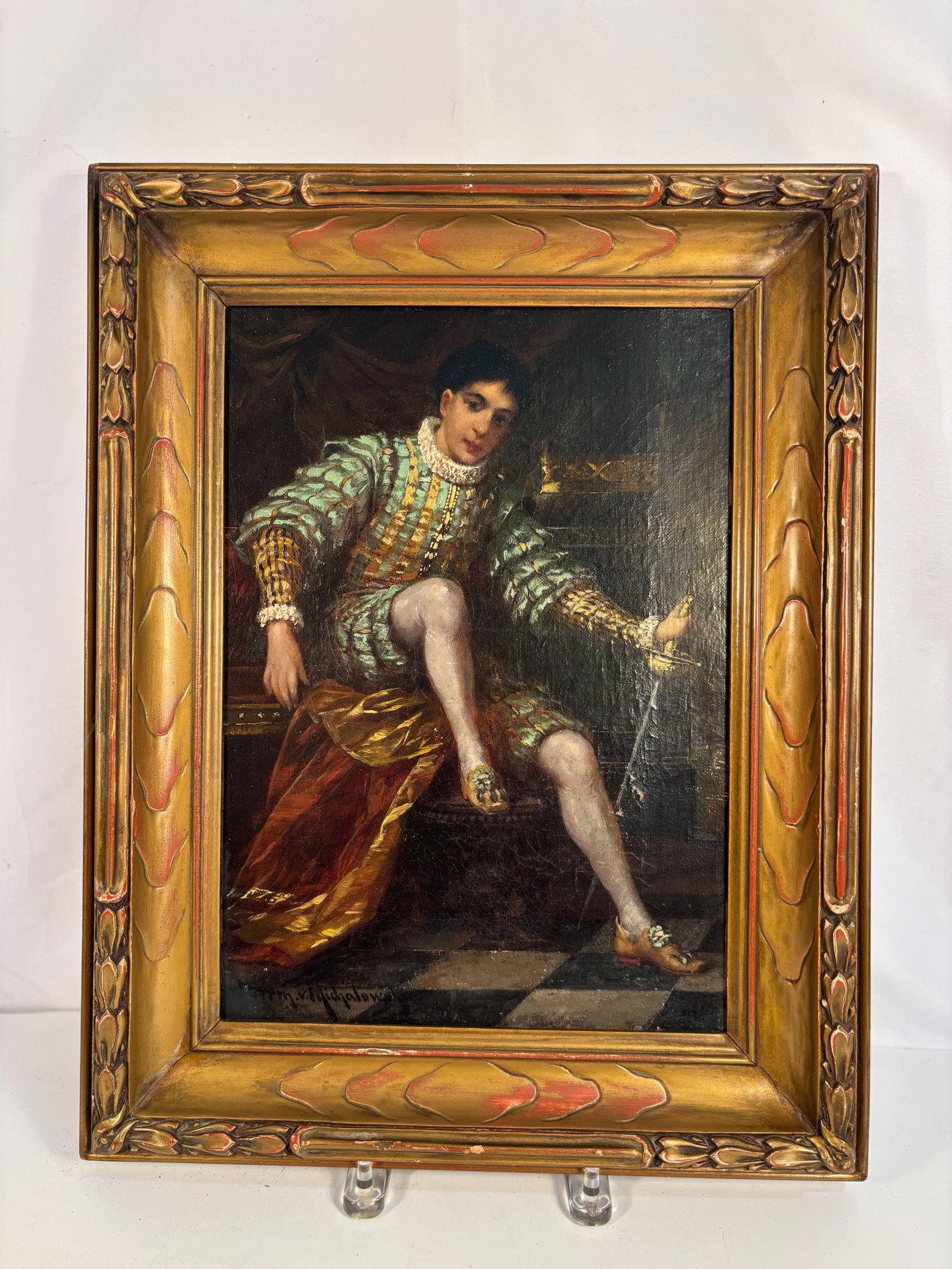 Herman von Michalowski (German, 1849–1912), “Portrait of a Young Nobleman in Renaissance: A finely detailed oil on canvas depicting a young nobleman seated in an interior, dressed in elaborate Renaissance attire with gilt-thread doublet and ruffled collar, holding a slender sword in one ha