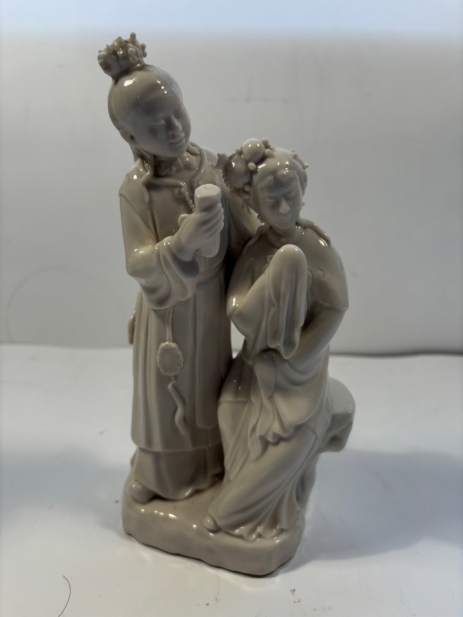 A Chinese Blank de Chine porcelain couple statue: Early 20th century ; Dimensions?Height: 9.5 inches