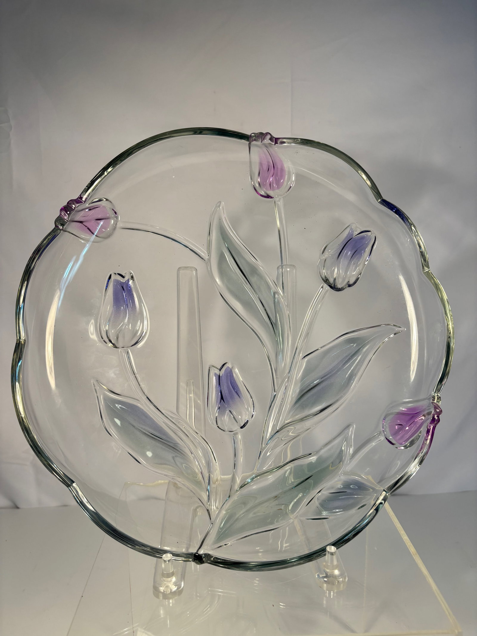 Mikasa Tivoli Crystal Tulips 12?? Round Glass Platter Serving Plate West Germany: The clear body molded in relief with tulip flowers and leaves, accented with lavender and violet glass. Dimensions?Diameter: 12 inches; Height: 2 inches.