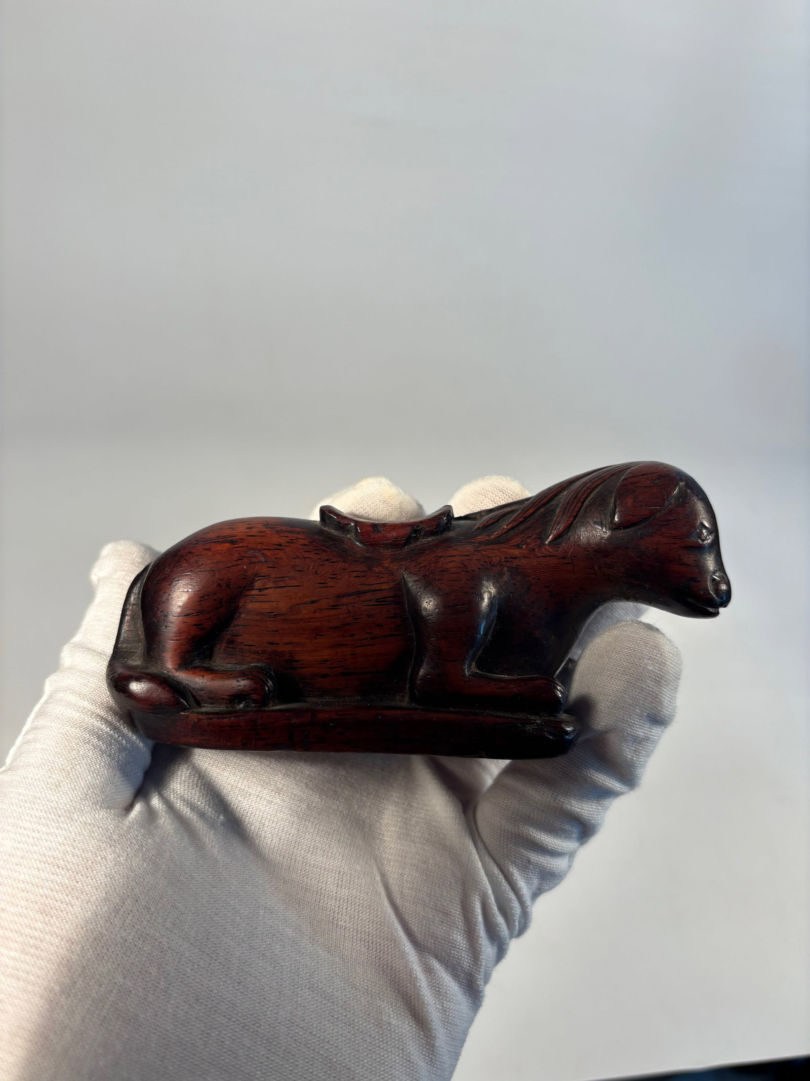 A Chinese rosewood/ huanghuali Carving – Reclining Horse (1 of 5)