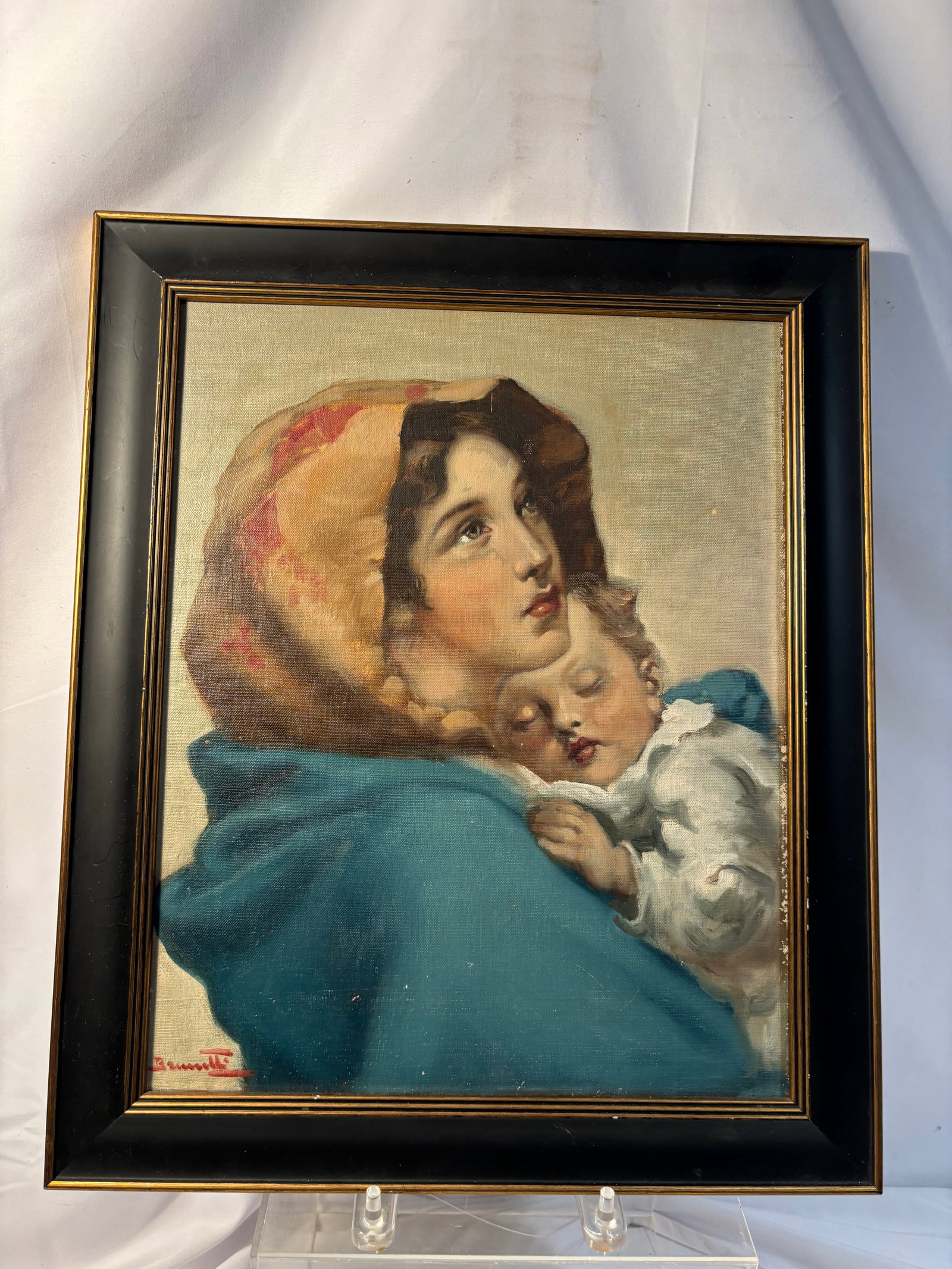 Vintage Madonna and Child Oil on canvas: Vintage devotional artwork depicting Madonna and Child in a tender classical composition. Frame Size: 18 inches x 15 inches.