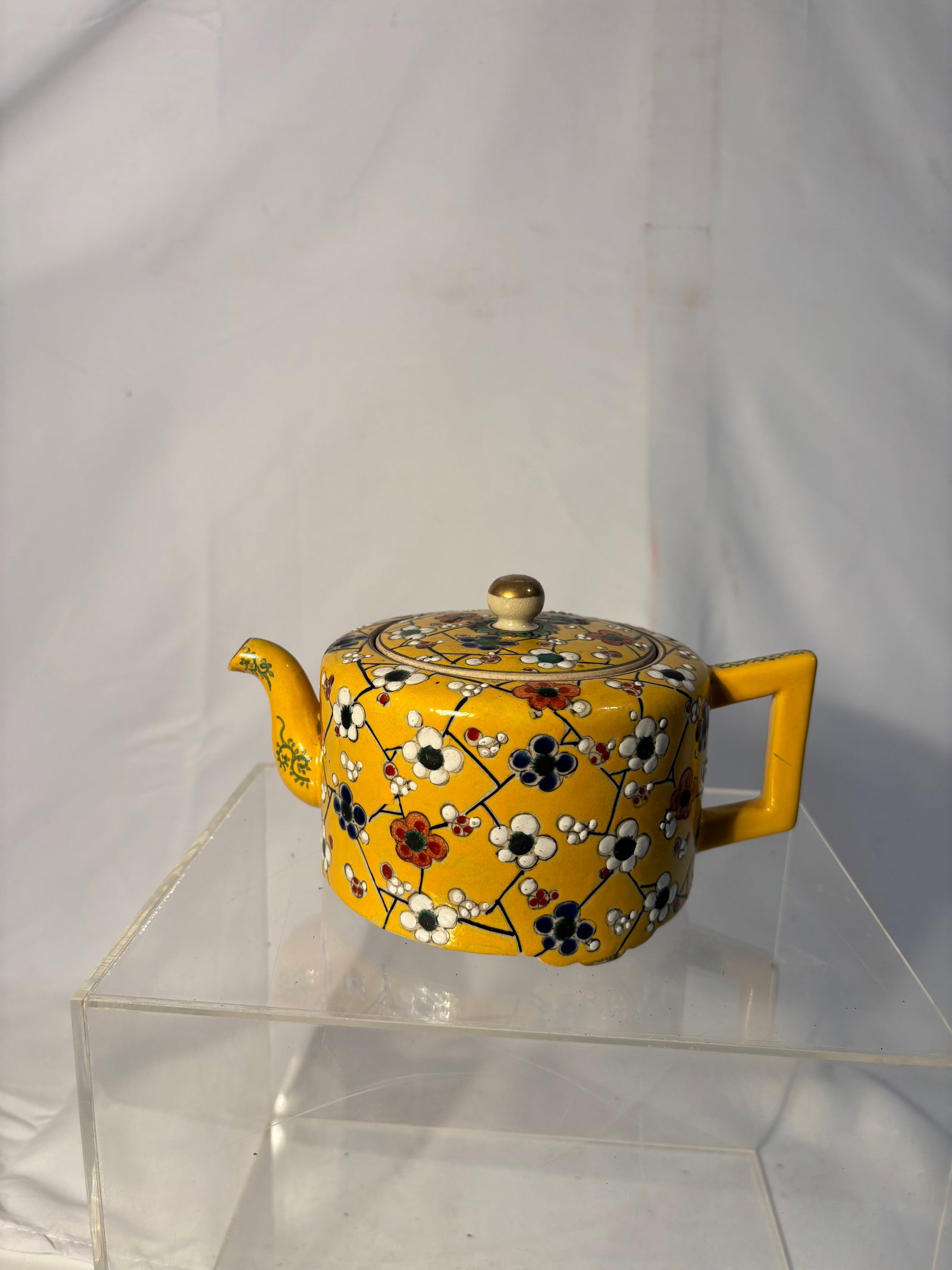 Japanese Hand-Painted Floral Kyusu Teapot, Signed “Sh?zan,?? Showa Period: Japanese side-handle teapot (kyusu) decorated with dense hand-painted floral motifs on a vibrant yellow ground. Signed “Sh?zan” to the base. Likely produced in Kyoto style during the Showa per