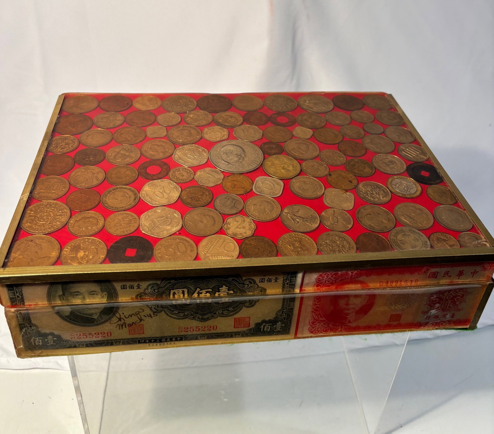 Vintage World Coins Inlaid Box, Mixed International Currency Display: Vintage decorative box with an eye-catching inlay of mixed world coins set against a vibrant red background. Includes assorted international currency, creating a unique and visually striking display. 