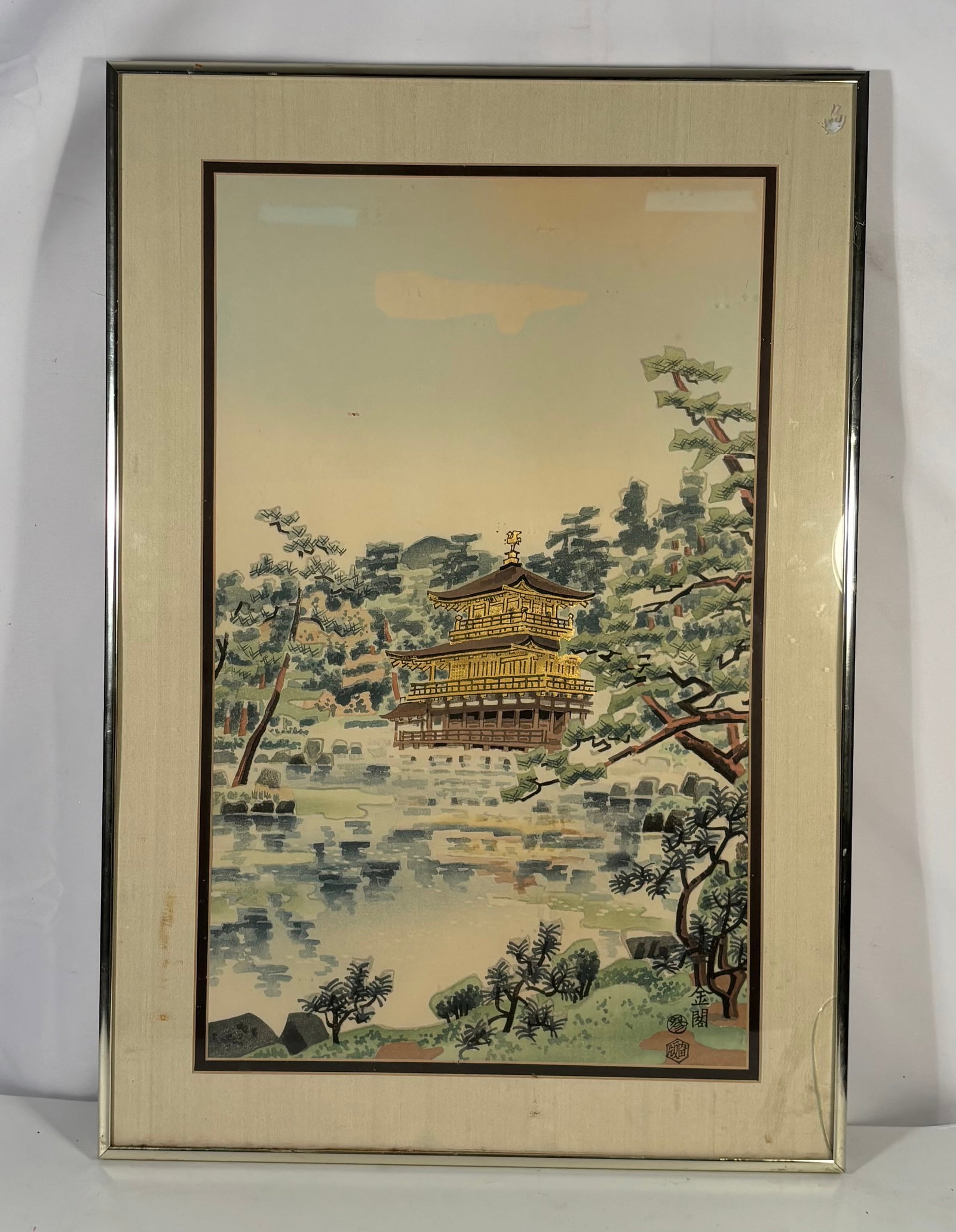 Eiichi Kotozuka (Japanese, 1906–1979) Uchida Woodblock “Golden Pavilion in Kyoto: A Japanese mid-20th century color woodblock print by Eiichi Kotozuka (1906–1979) depicting Kinkaku-ji (The Golden Pavilion), Kyoto, issued by Uchida Art Co. The iconic temple is shown reflected acro